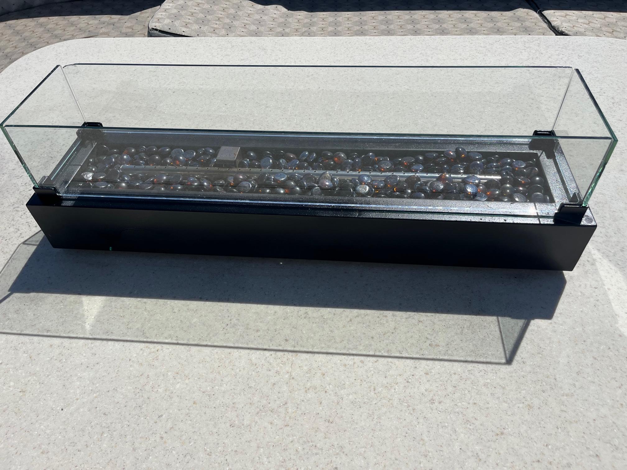 Glass-enclosed decorative display on a Hatteras 70' Cockpit Motor Yacht, 1986 model.