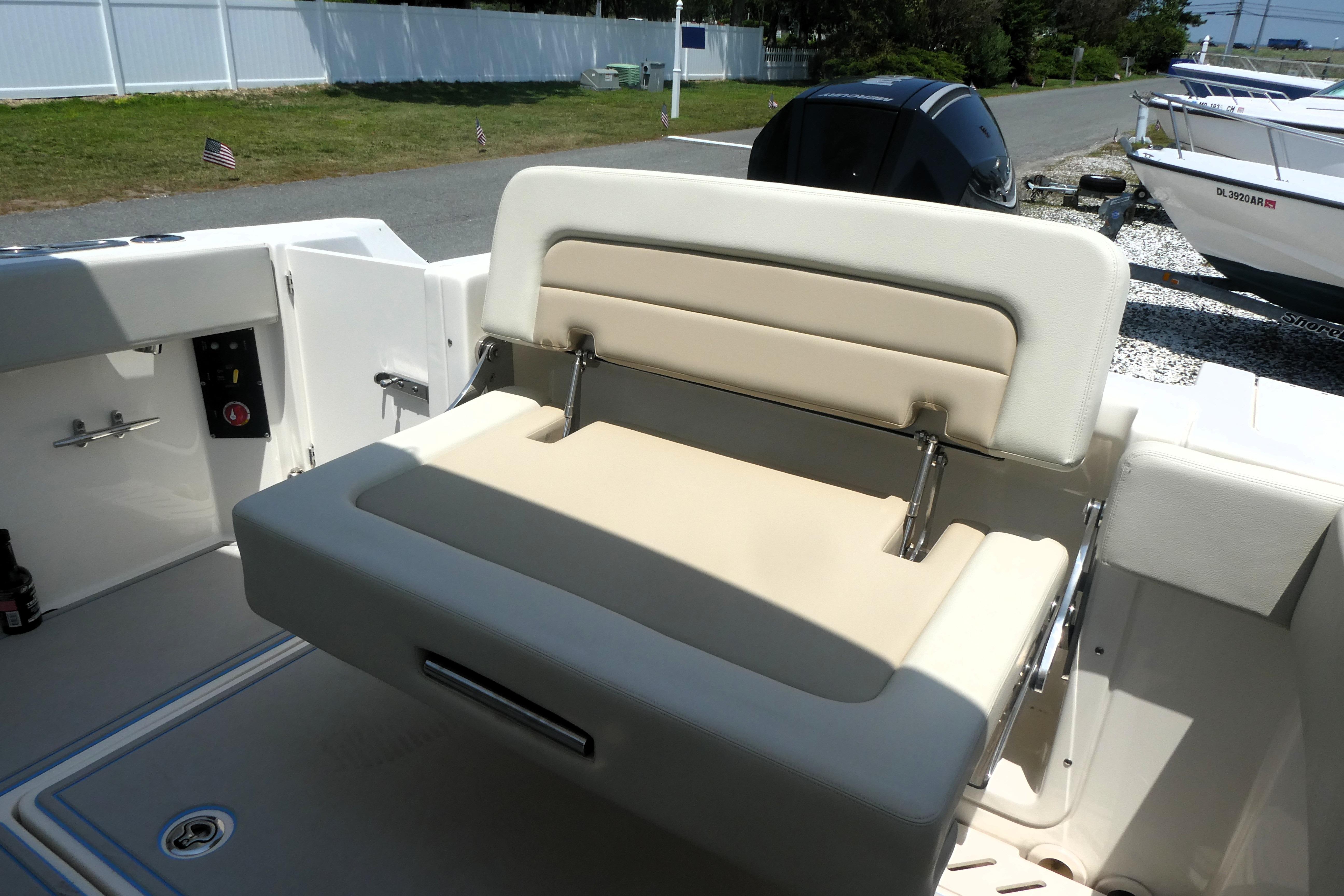 2022 Boston Whaler 240 Vantage boat seat with beige upholstery and sleek design.