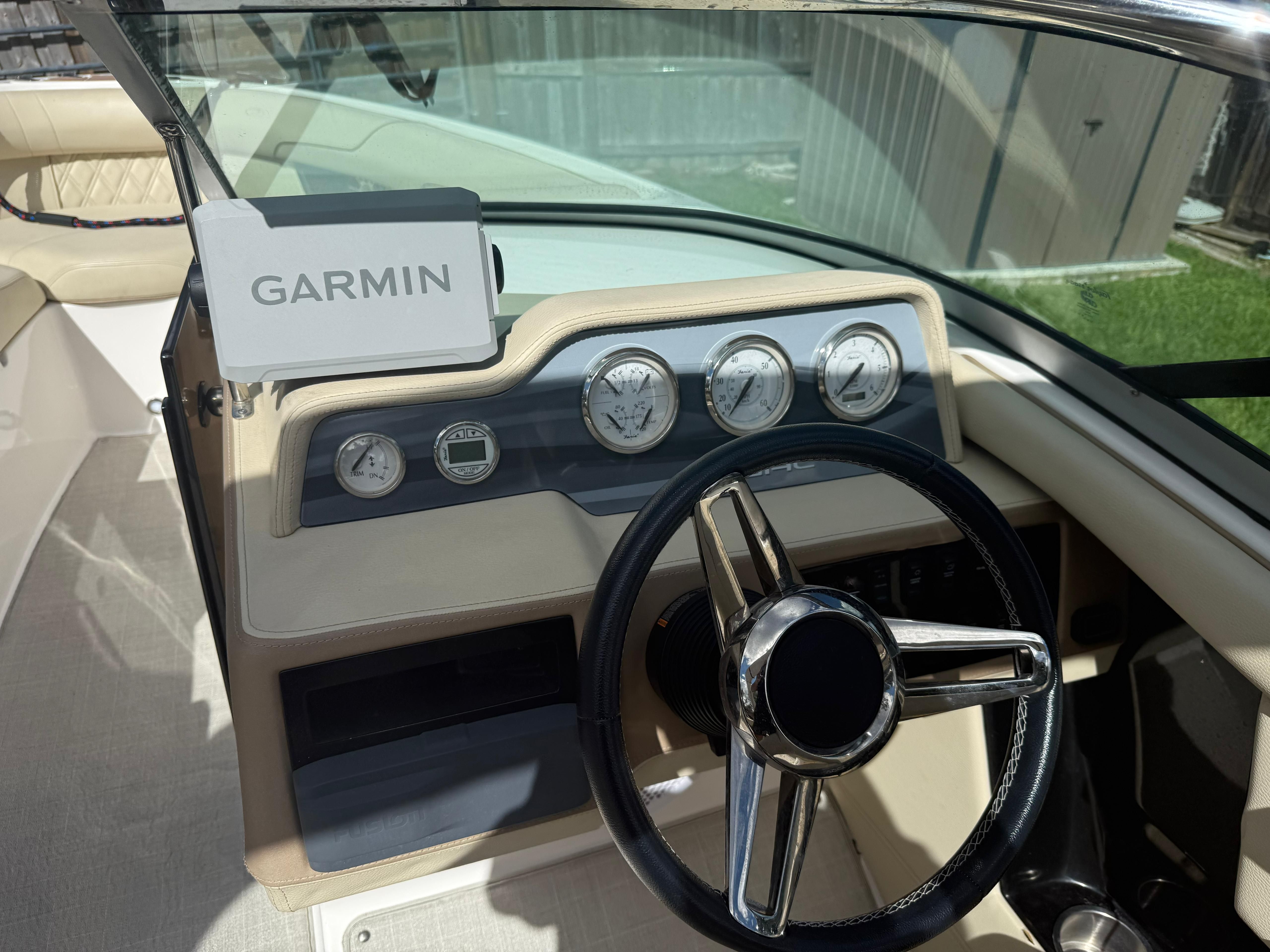 Interior view of a 2020 Regal 2300 Bowrider boat with Garmin display.