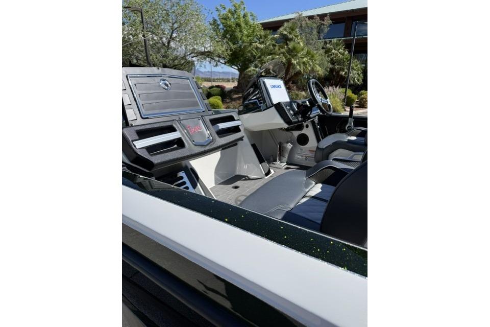 2026 Ranger Z520R Cup-Equipped boat interior with modern dashboard and seating.