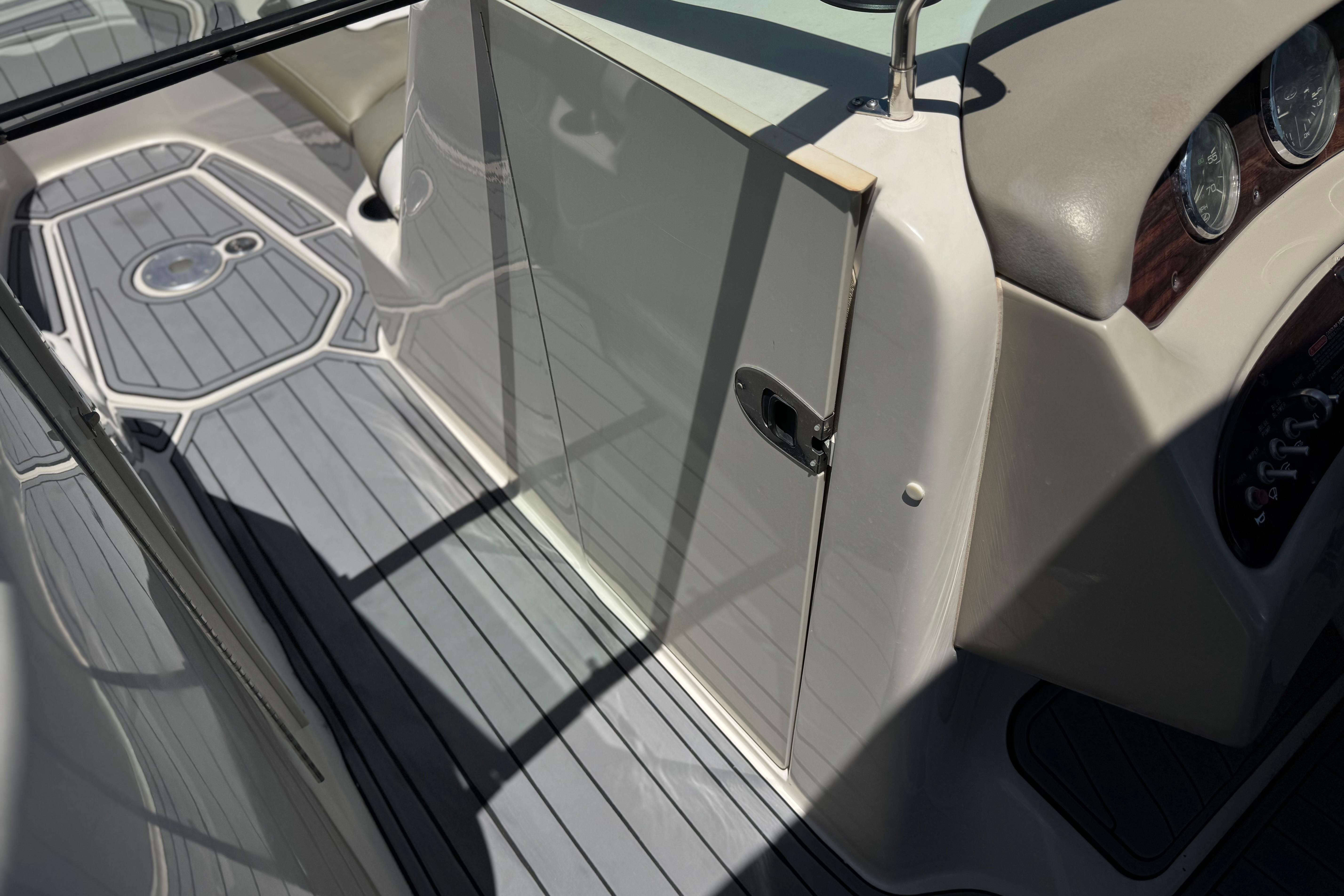 2007 Sea Ray 240 Sundeck interior with sleek design and modern dashboard features.