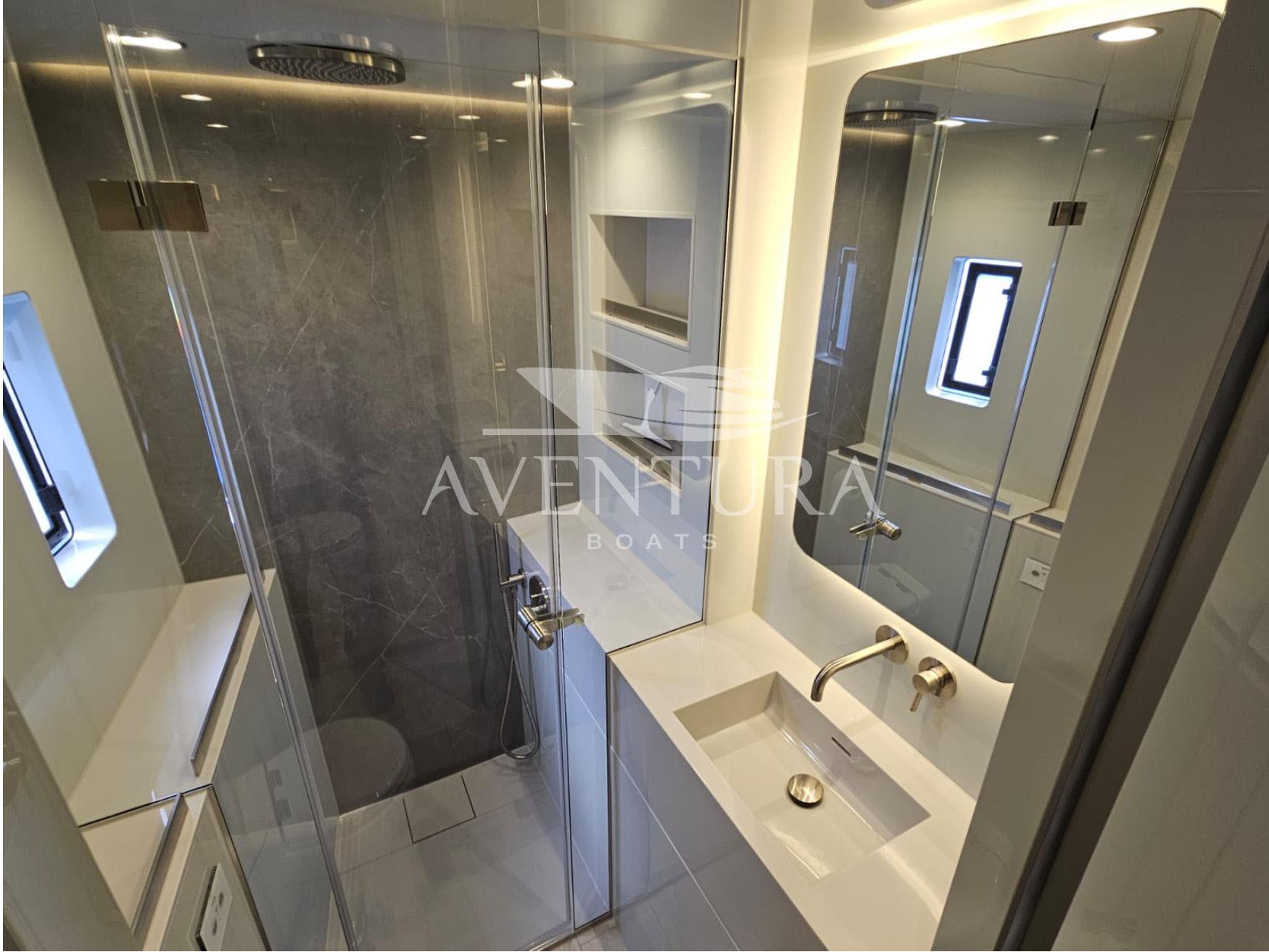 Luxurious bathroom in 2021 Sunreef 60 Power yacht with modern fixtures and elegant design.