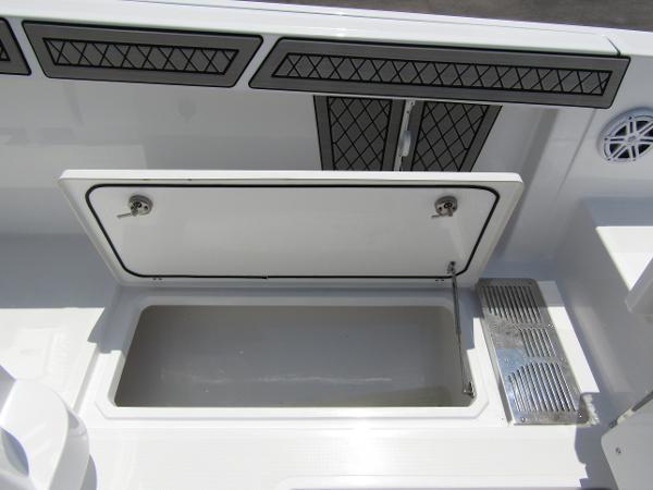 2024 Wellcraft 352 Fisherman boat storage compartment with open hatch.