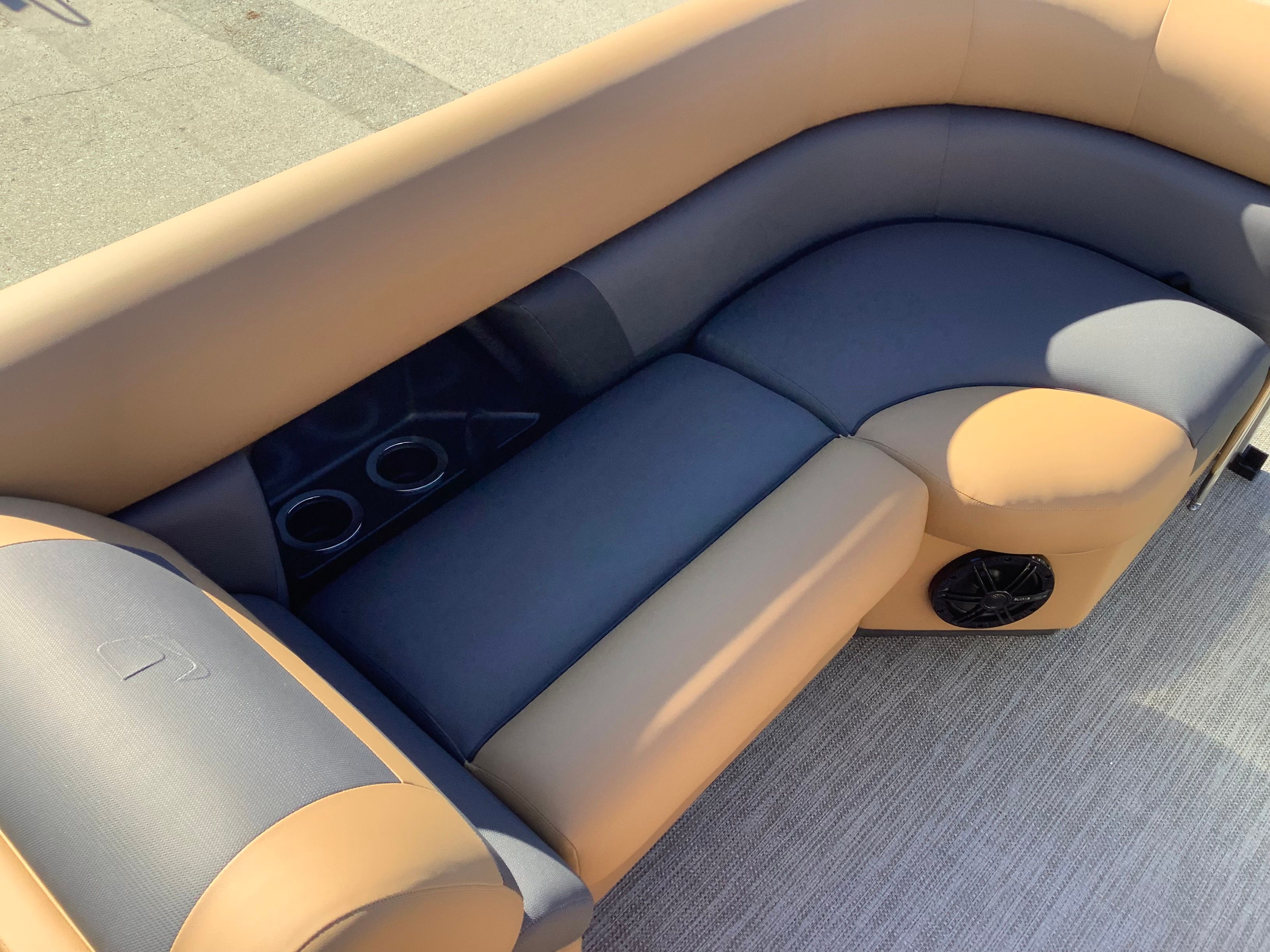 Interior of 2026 Landau 21 Island Breeze with comfortable seating.