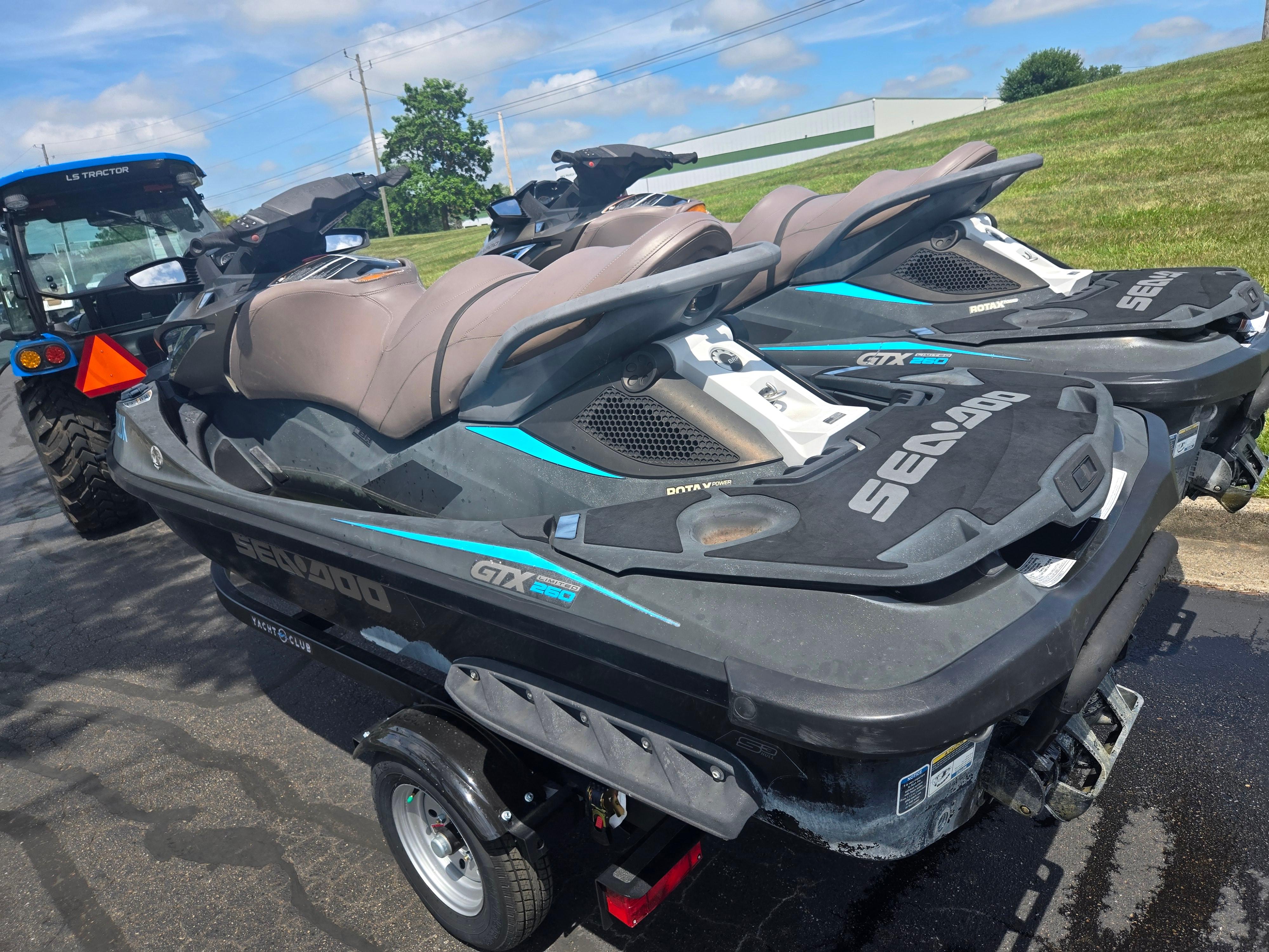 2016 Sea-Doo GTX Limited iS 260 jet skis on a trailer, ready for adventure.