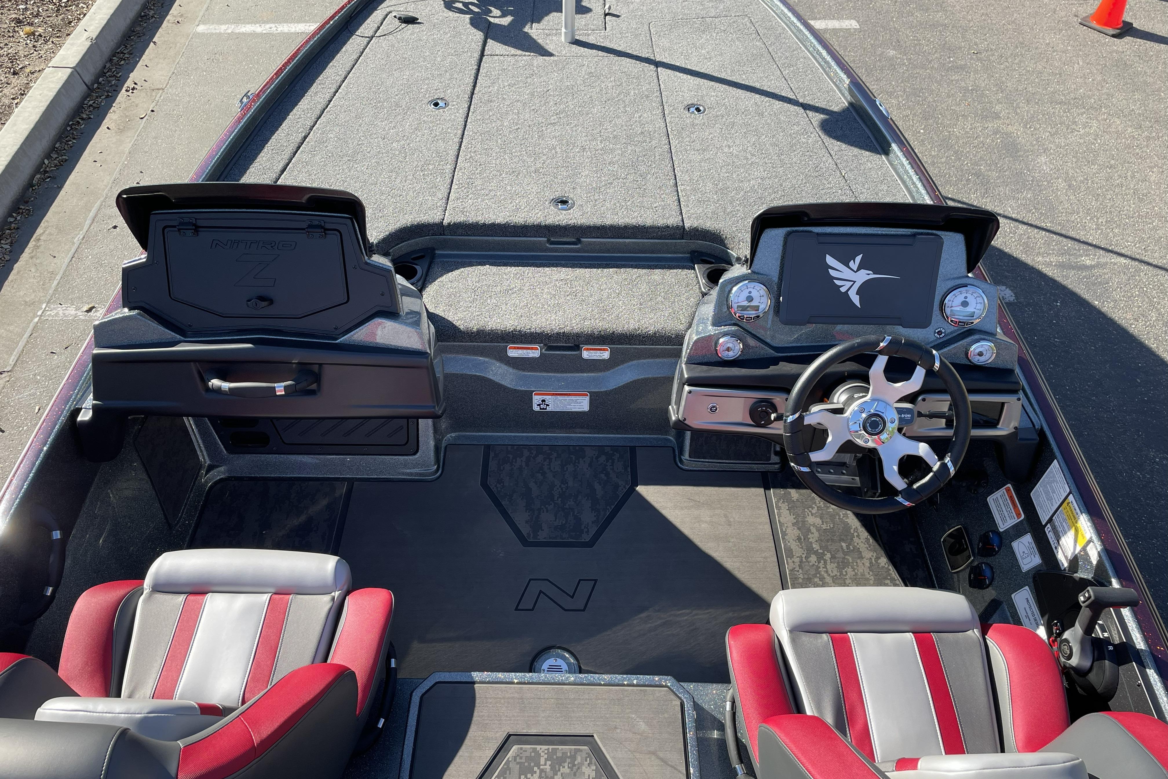 2026 Nitro Z20 XL boat interior with steering wheel and dashboard controls.