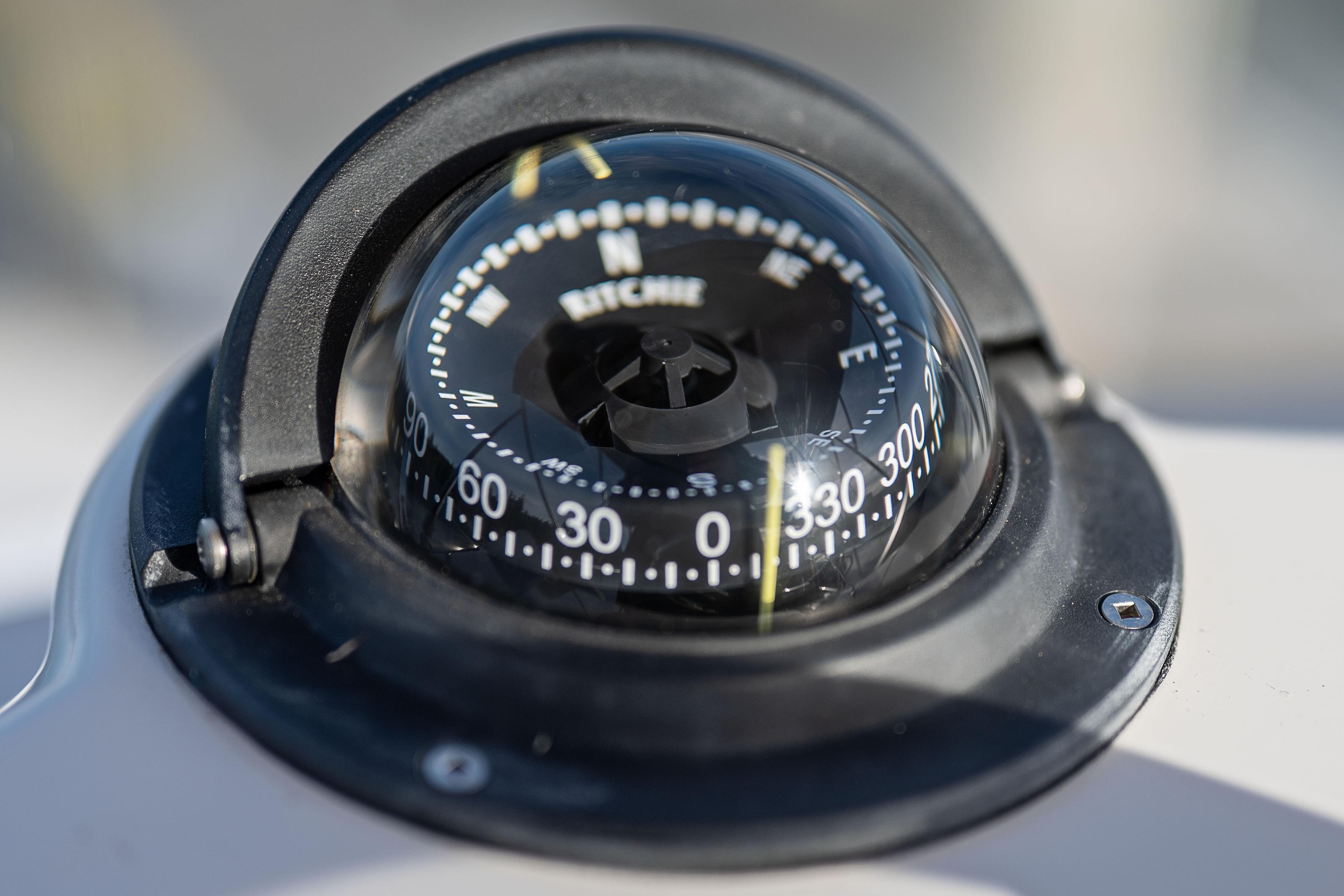 Close-up of a compass on a 2014 Ranger Tug R-31 CB boat.