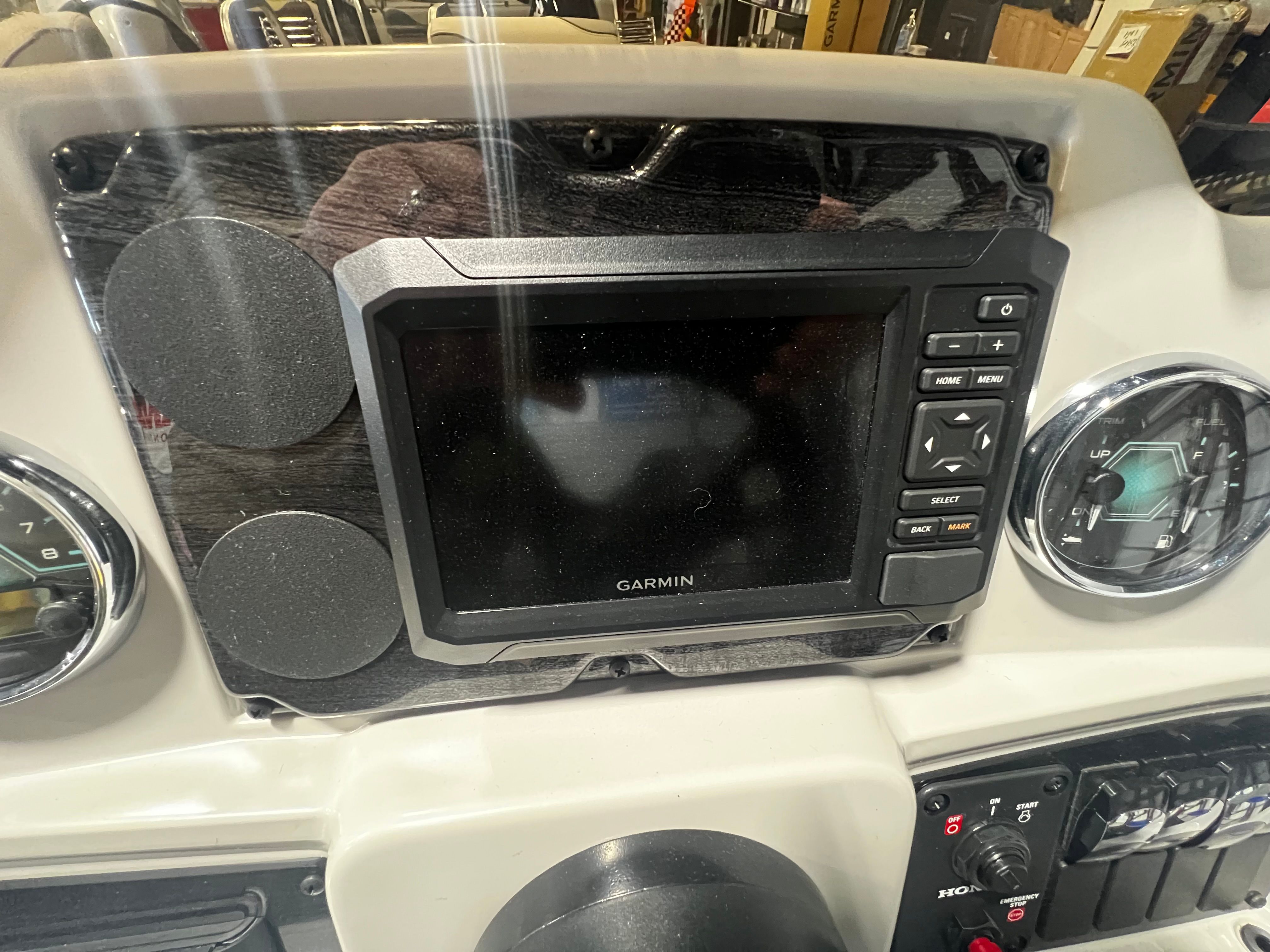 2026 Tahoe 2180 Sport Quad Lounger dashboard with Garmin navigation system.