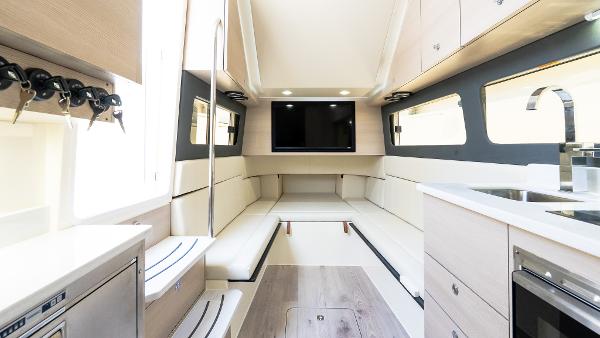 Luxurious interior of 2025 Scout 425 LXF boat with modern amenities and sleek design.