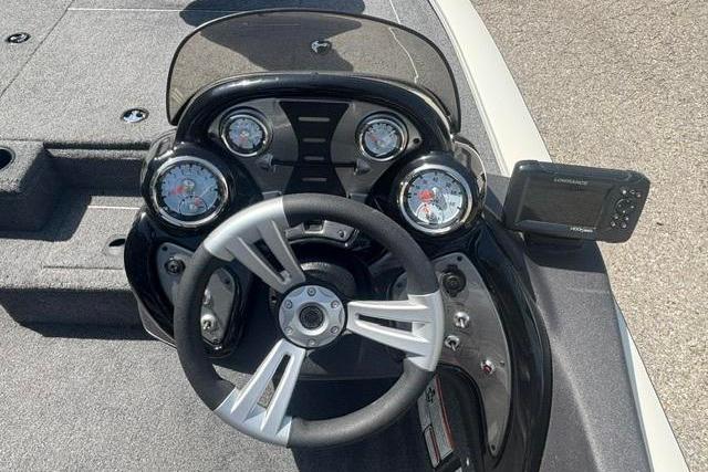 2021 Tracker Pro Team 175 TXW Tournament Edition boat dashboard with steering wheel and gauges.