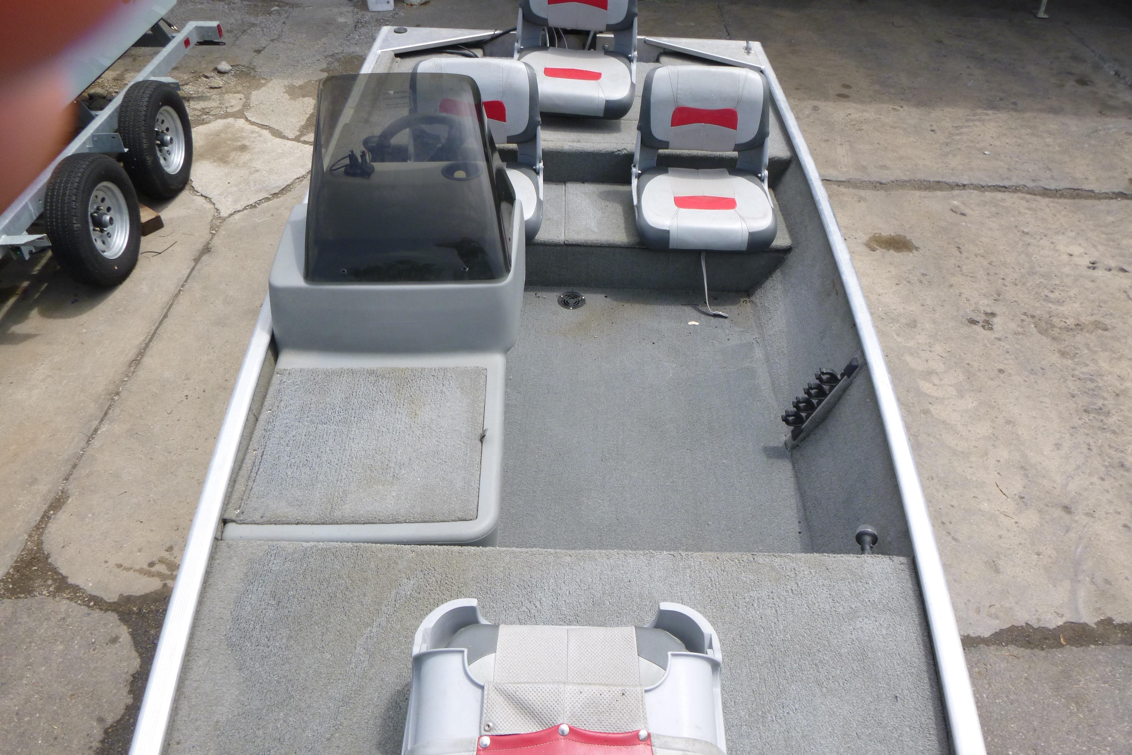 2011 Tracker Pro Angler 16 boat interior with seating and steering console.