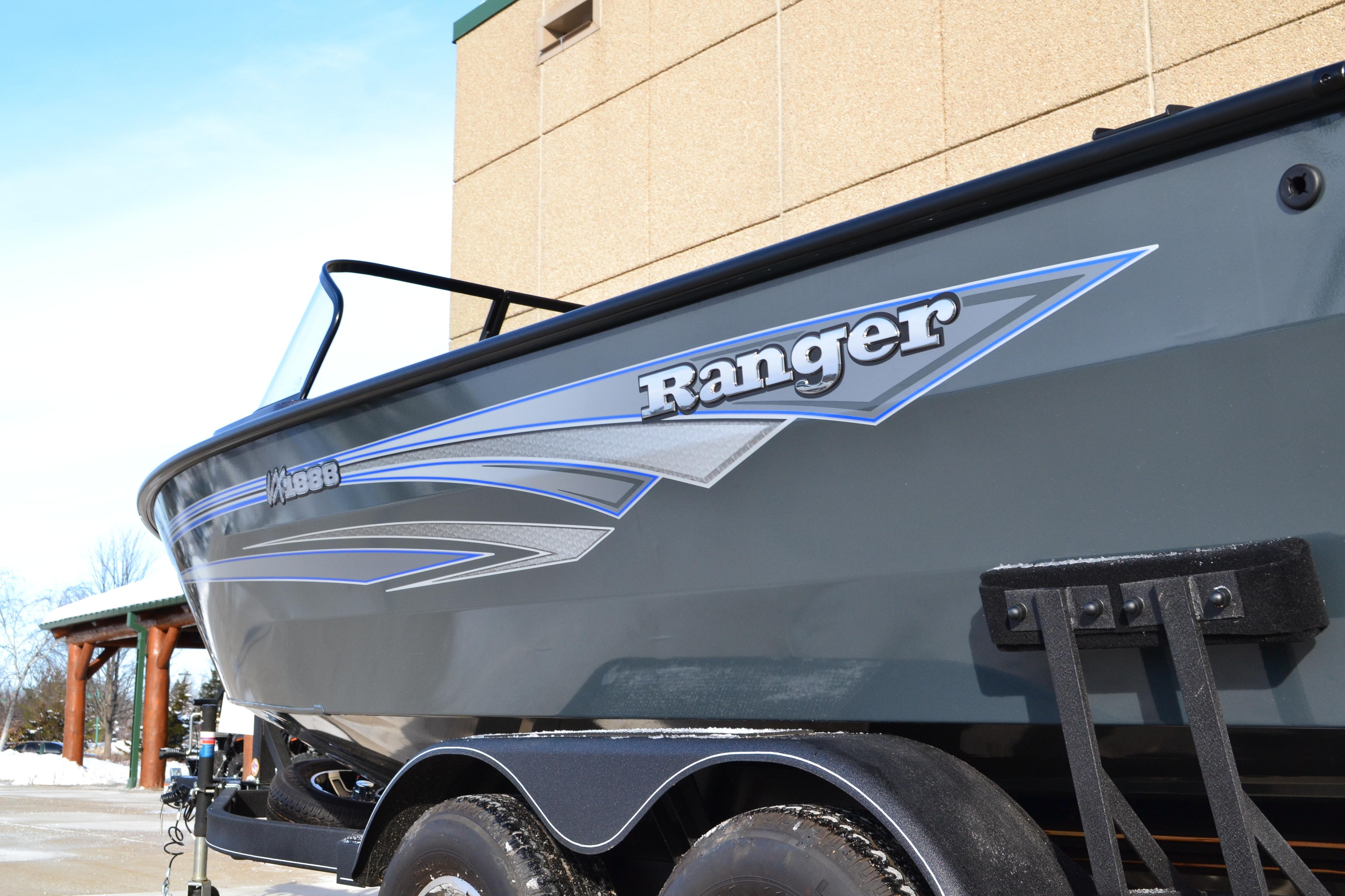 2026 Ranger VX1888 WT boat on trailer, showcasing sleek design and branding.