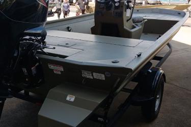 2026 Tracker Grizzly 1860 CC boat, rear view, parked on trailer.