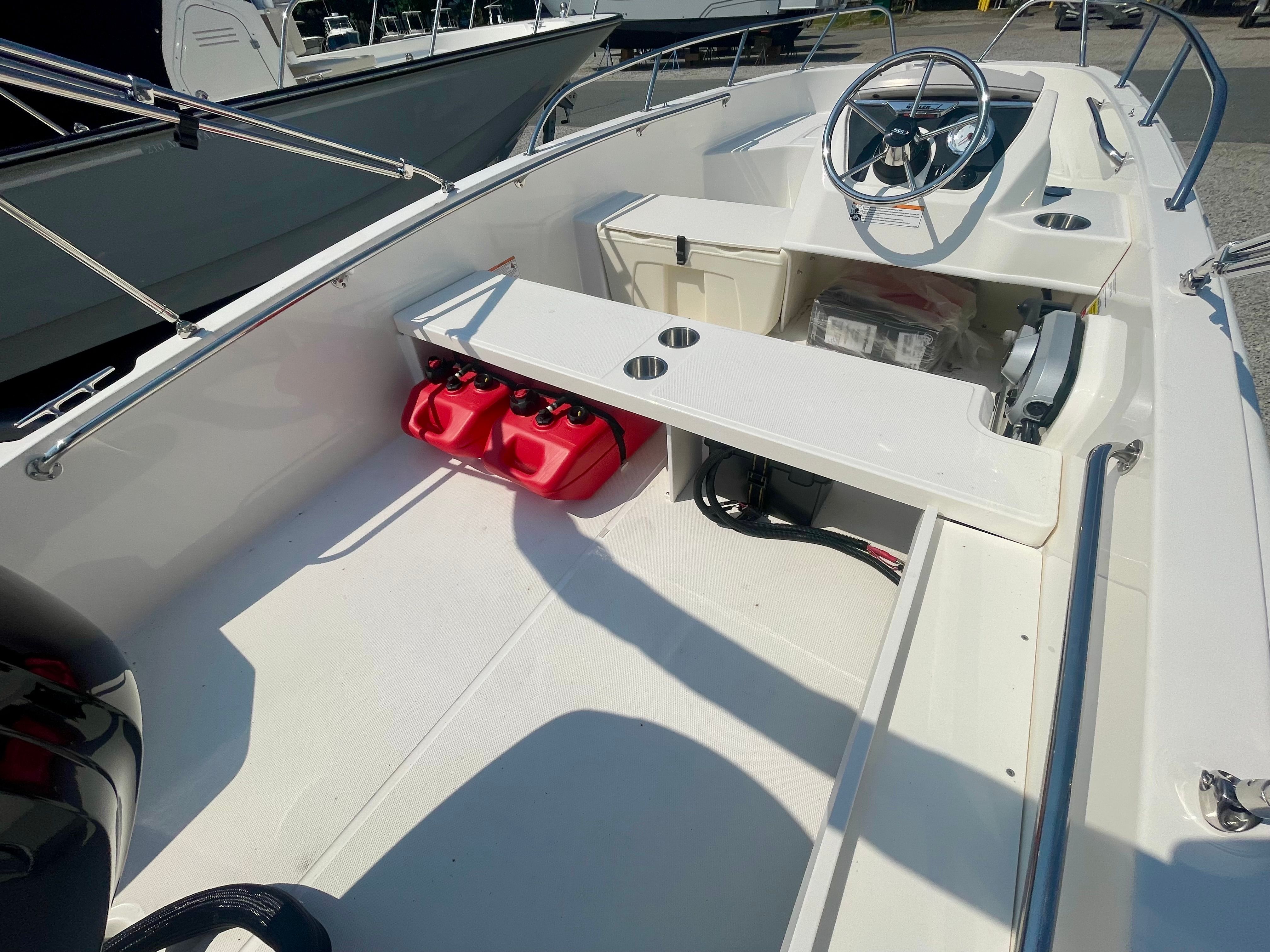 The image shows the cockpit of a Boston Whaler 160 Super Sport boat.