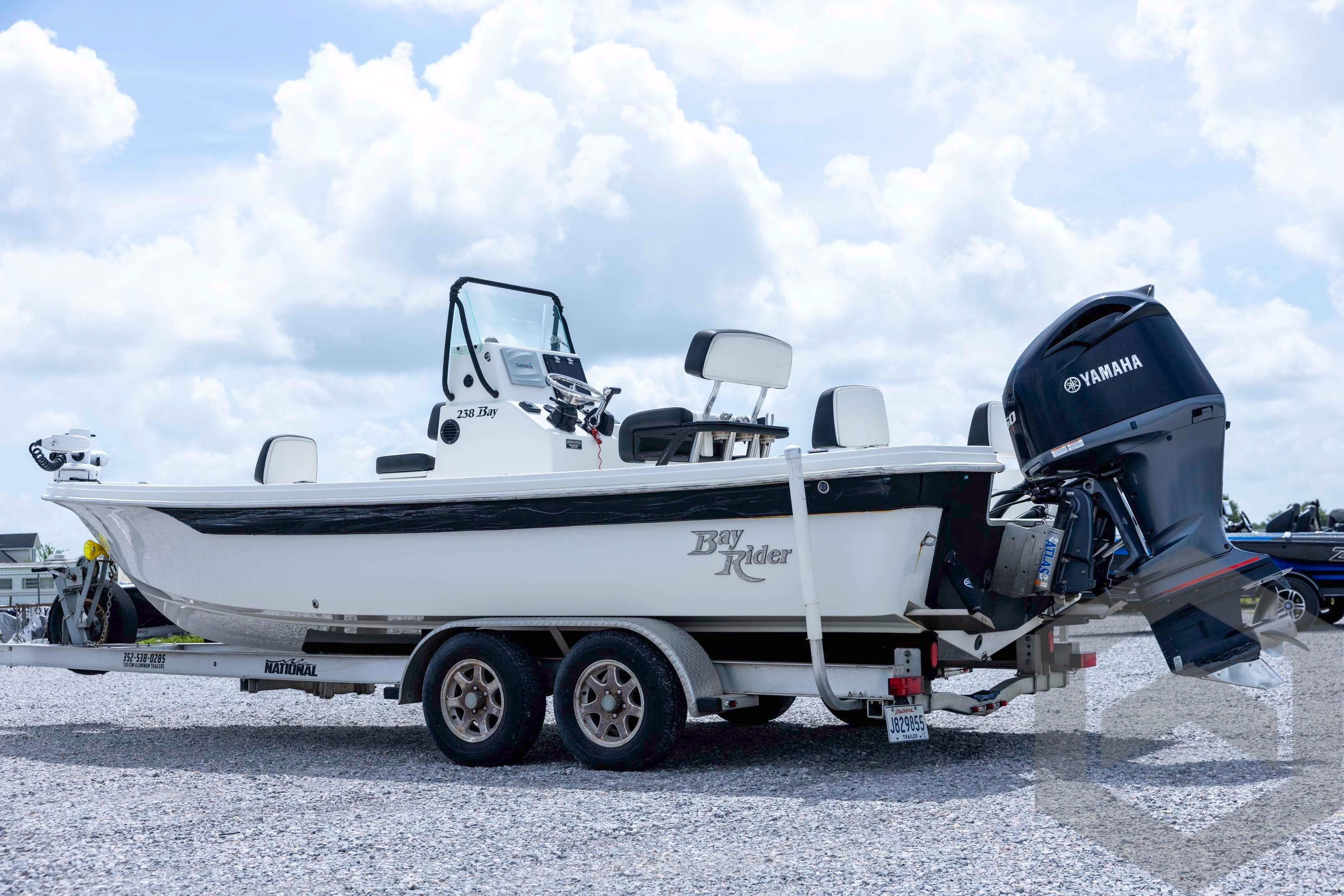 2018 Bay Rider 238 Bay boat on trailer with Yamaha outboard motor.
