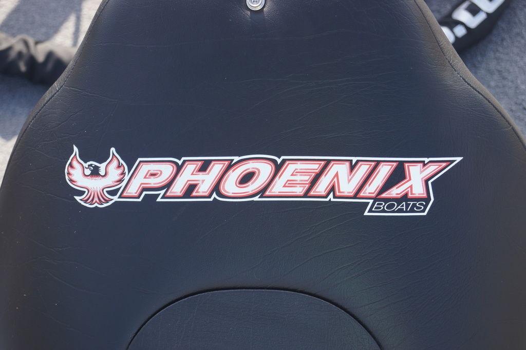 Phoenix 921 Elite 2025 boat seat with logo, featuring a stylized phoenix design.