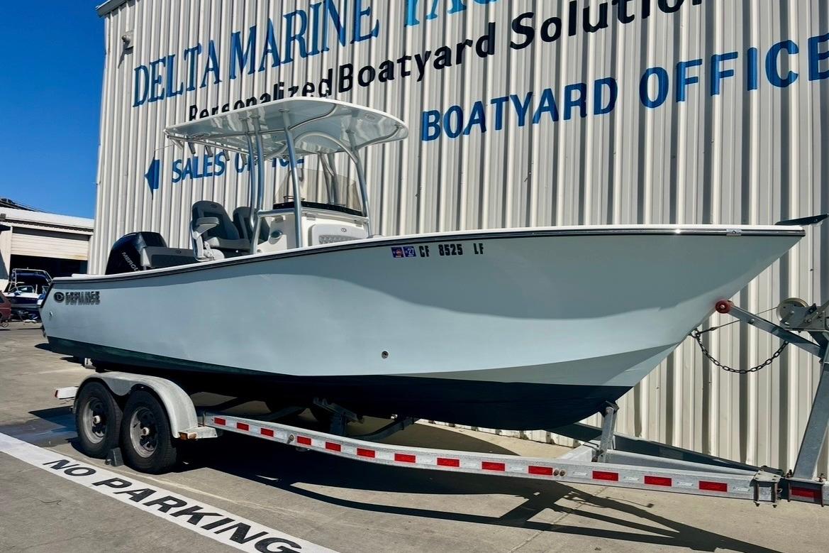2025 Defiance Catalina 240 boat on trailer at Delta Marine sales office.