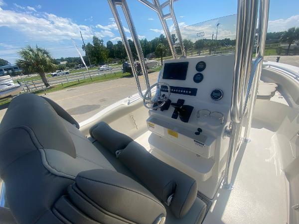 2024 Key West 239 FS boat interior with helm and seating.