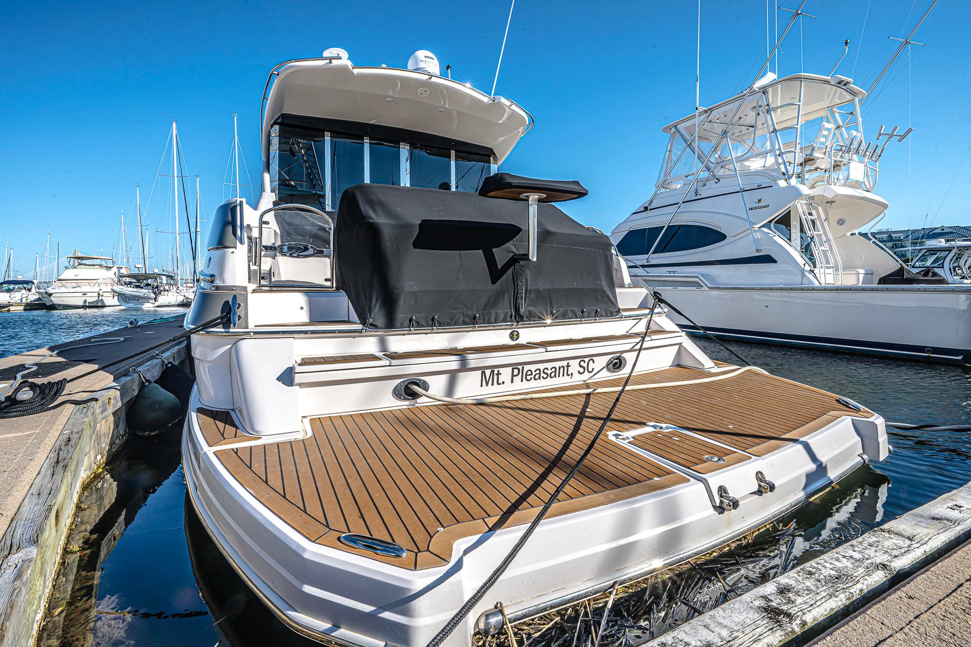 2016 Regal 46 Sport Coupe yacht docked in Mt. Pleasant, SC marina.
