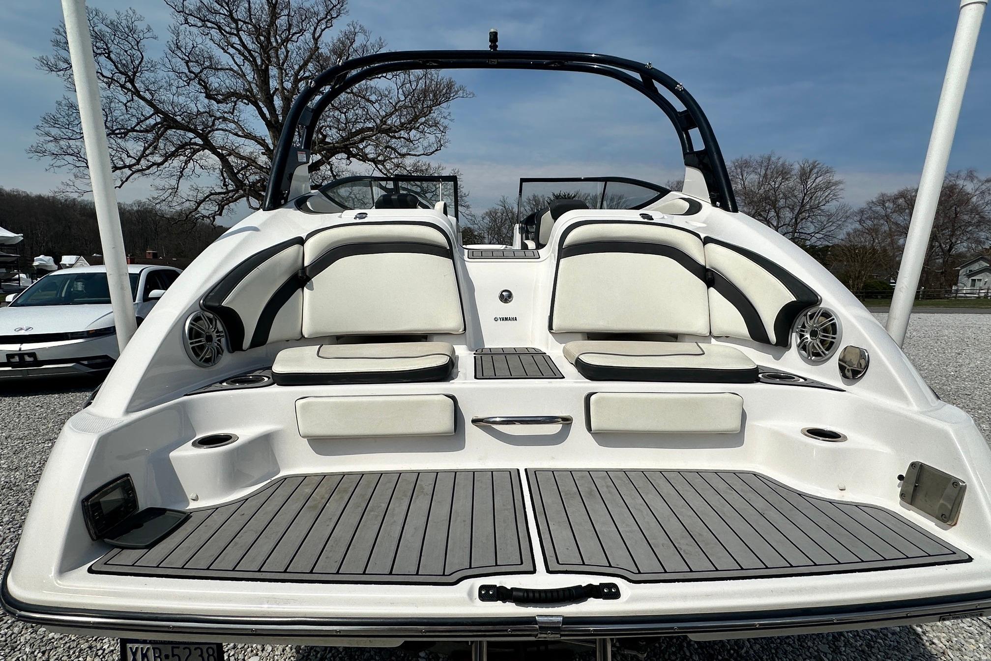 2016 Yamaha 242 Limited S boat with sleek seating and modern design.