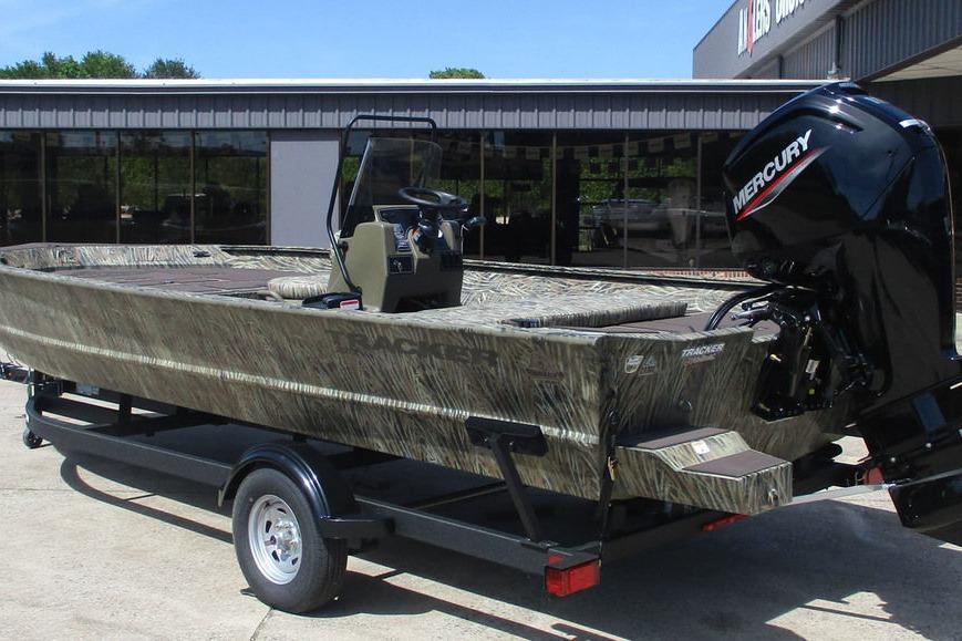 2026 Tracker Grizzly 2072 CC boat with Mercury engine on trailer.