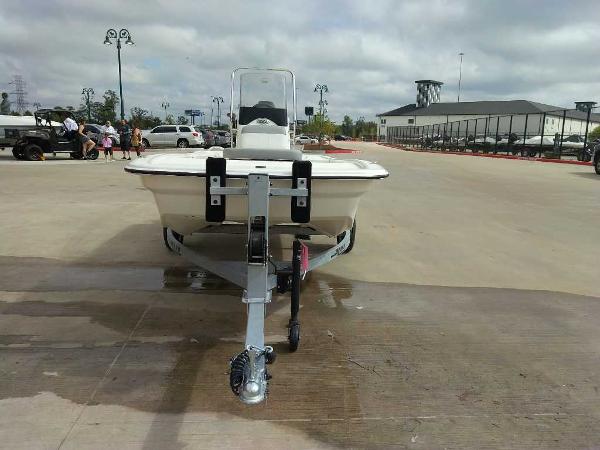 2025 Mako Pro Skiff 13 CC on trailer in parking lot.