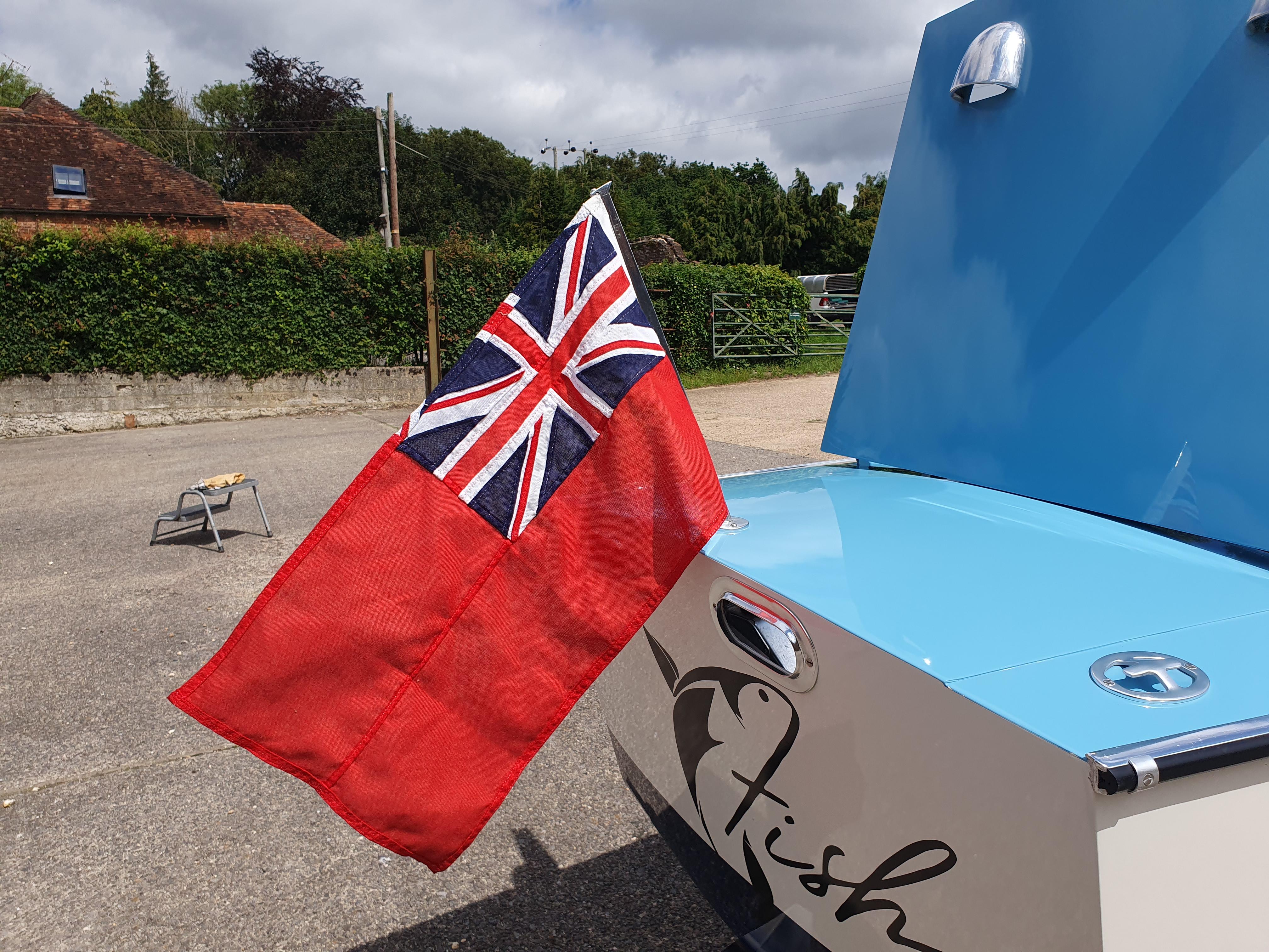 1963 Albatross Continental Mark II with British maritime flag displayed on the rear.