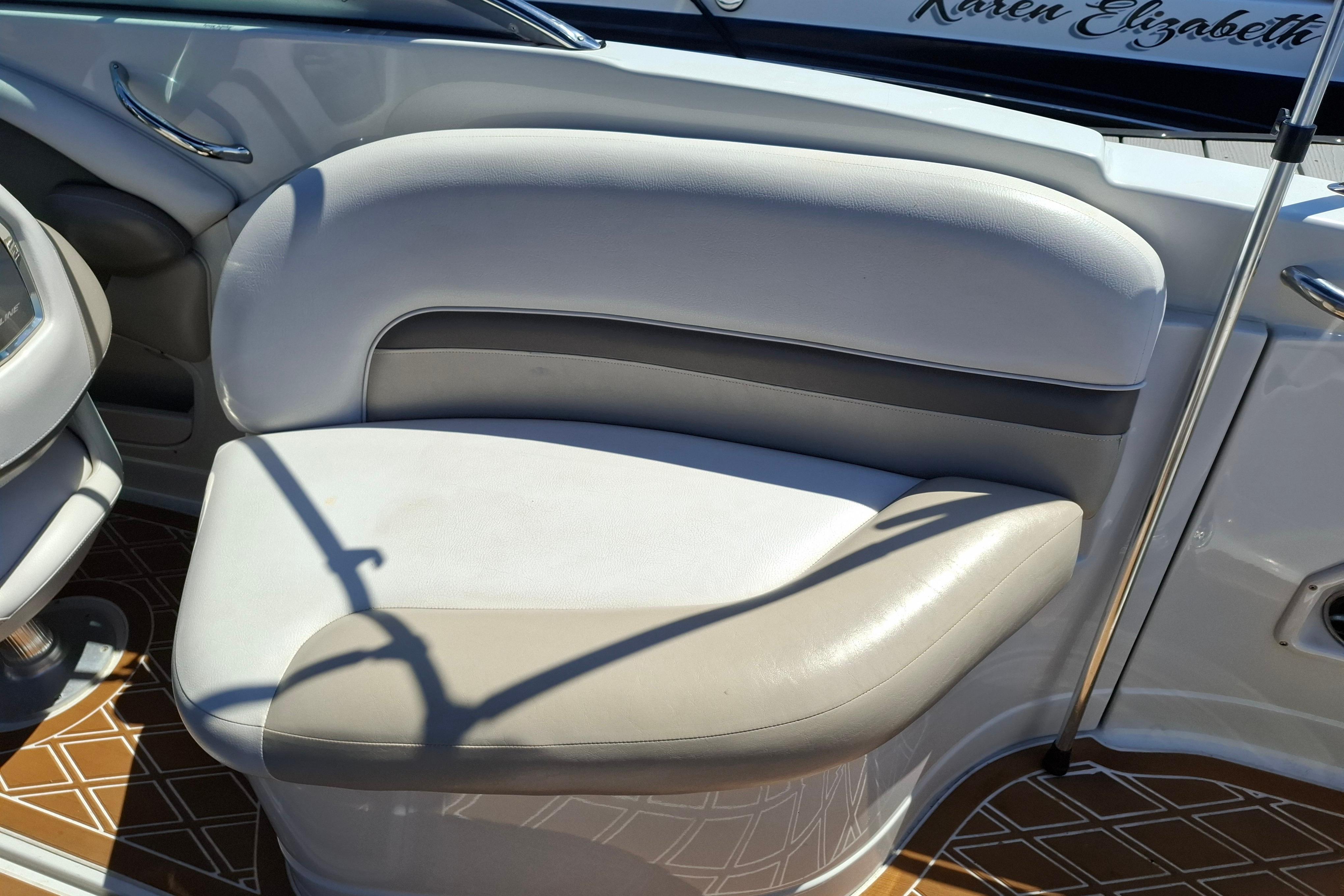 2013 Crownline Eclipse E6 boat interior with cushioned seating and sleek design.