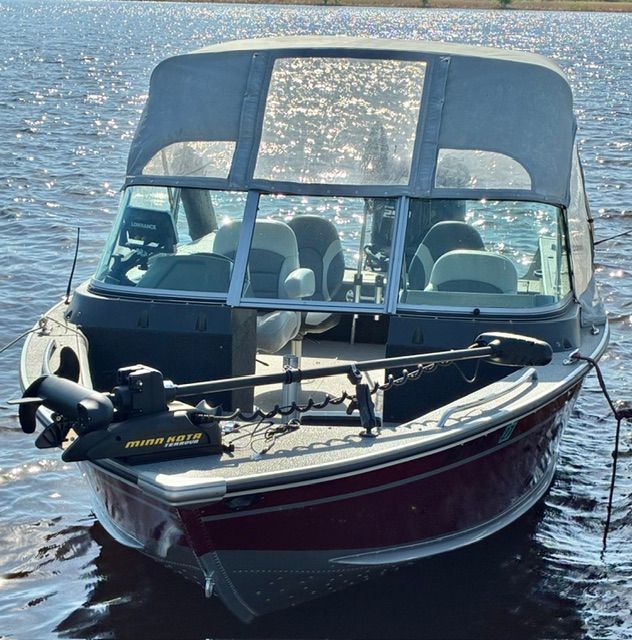 2016 Alumacraft Trophy 205 Sport boat on the water.