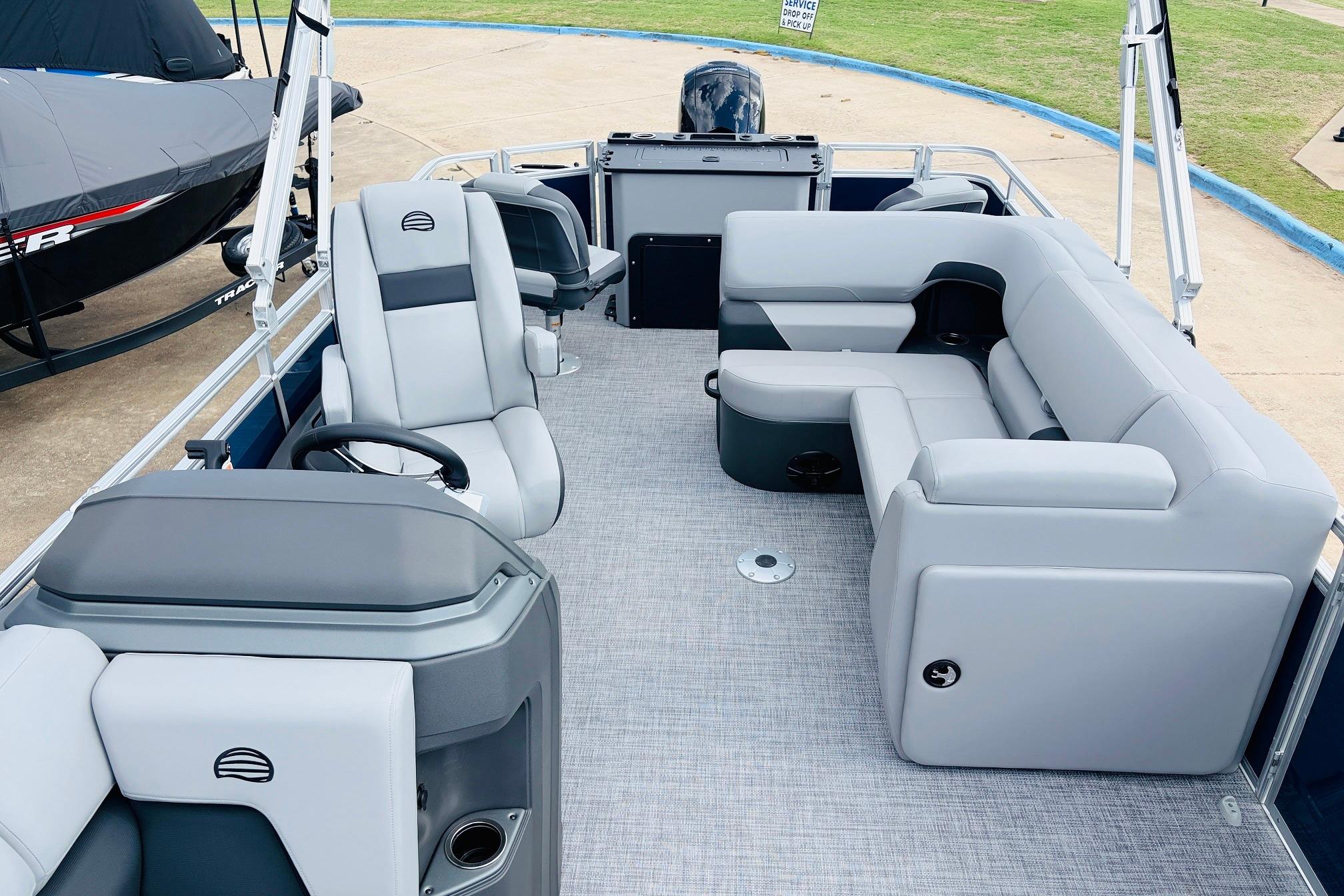 2026 Sun Tracker SportFish 22 DLX pontoon boat with spacious seating and modern design.