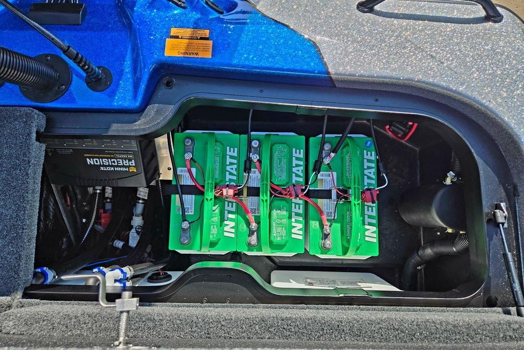 Battery compartment of a 2026 Skeeter ZXE20 boat with Interstate batteries.