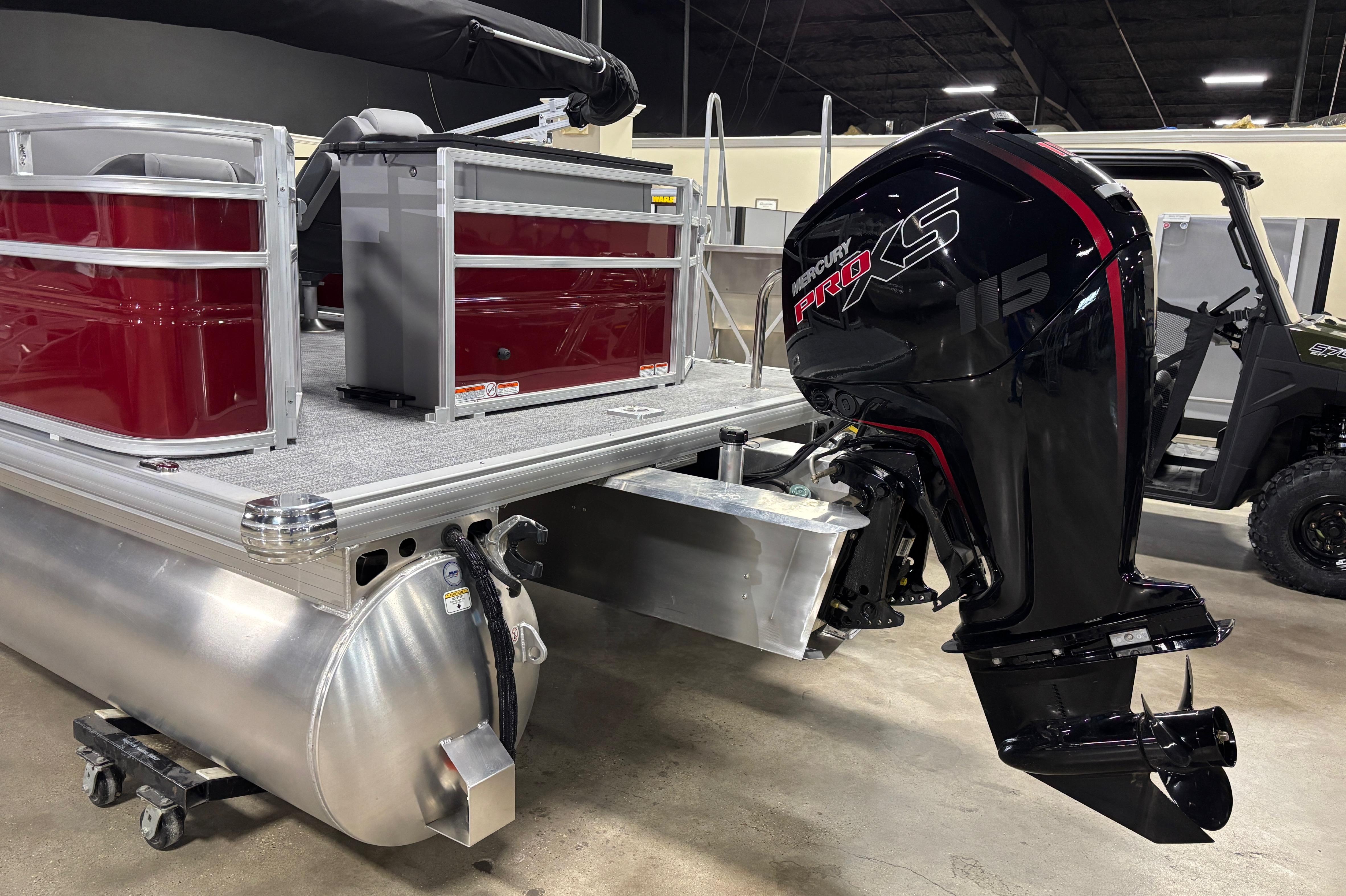 2026 Sun Tracker SportFish 20 DLX pontoon boat with Mercury Pro XS 115 outboard motor.