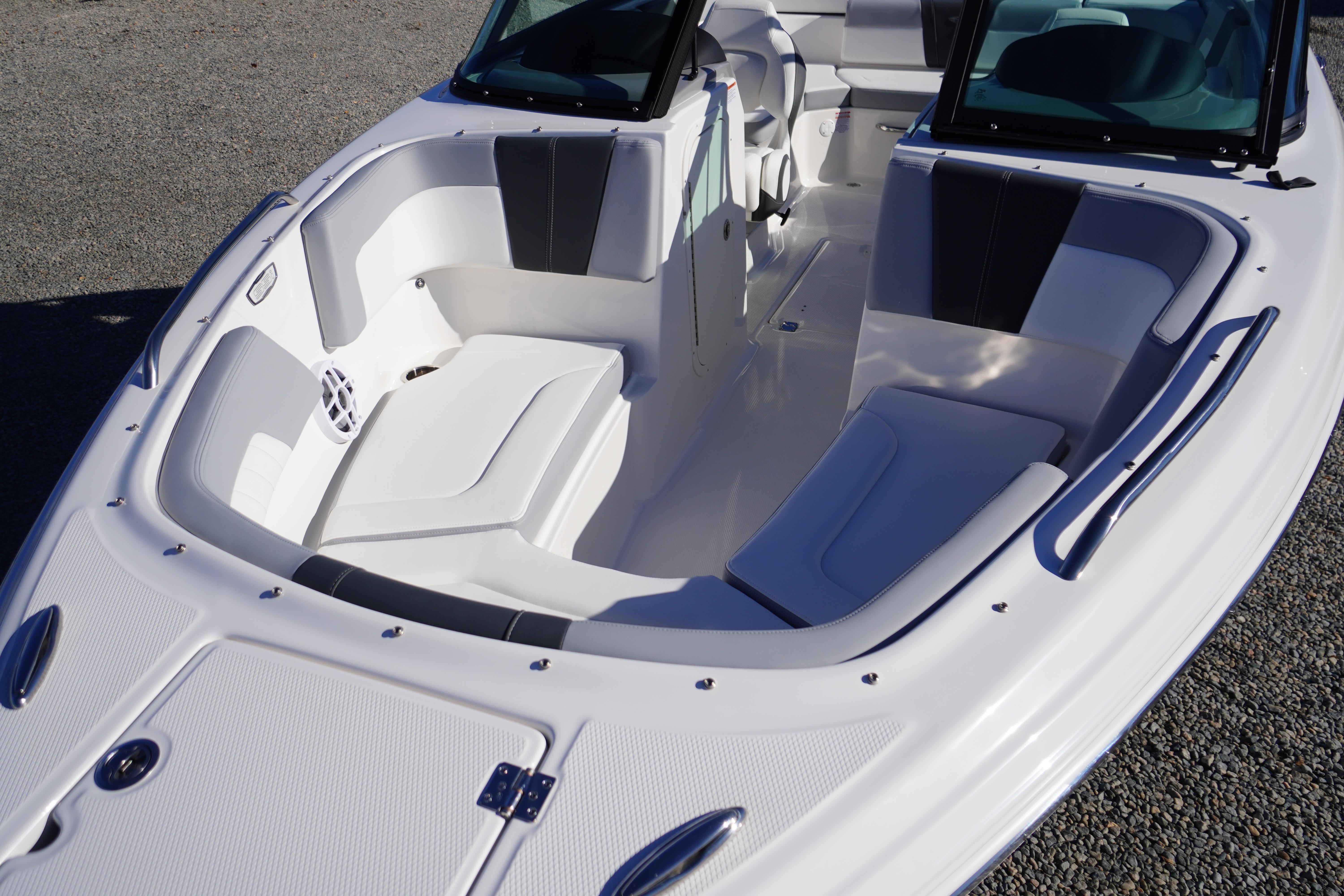 2026 Chaparral 23 SSi boat interior with white seating and sleek design.