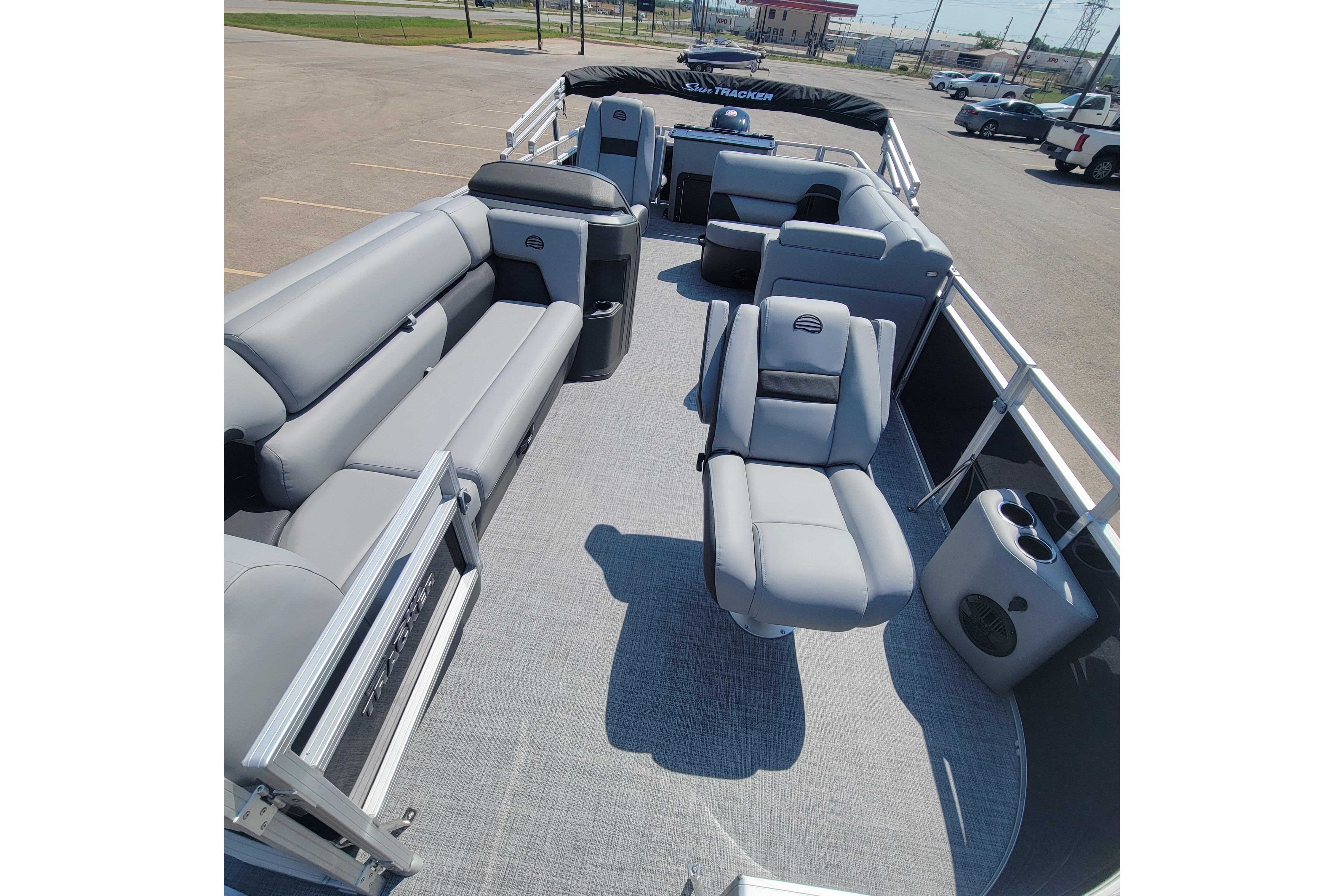 2026 Sun Tracker SportFish 20 DLX pontoon boat with spacious seating and modern design.