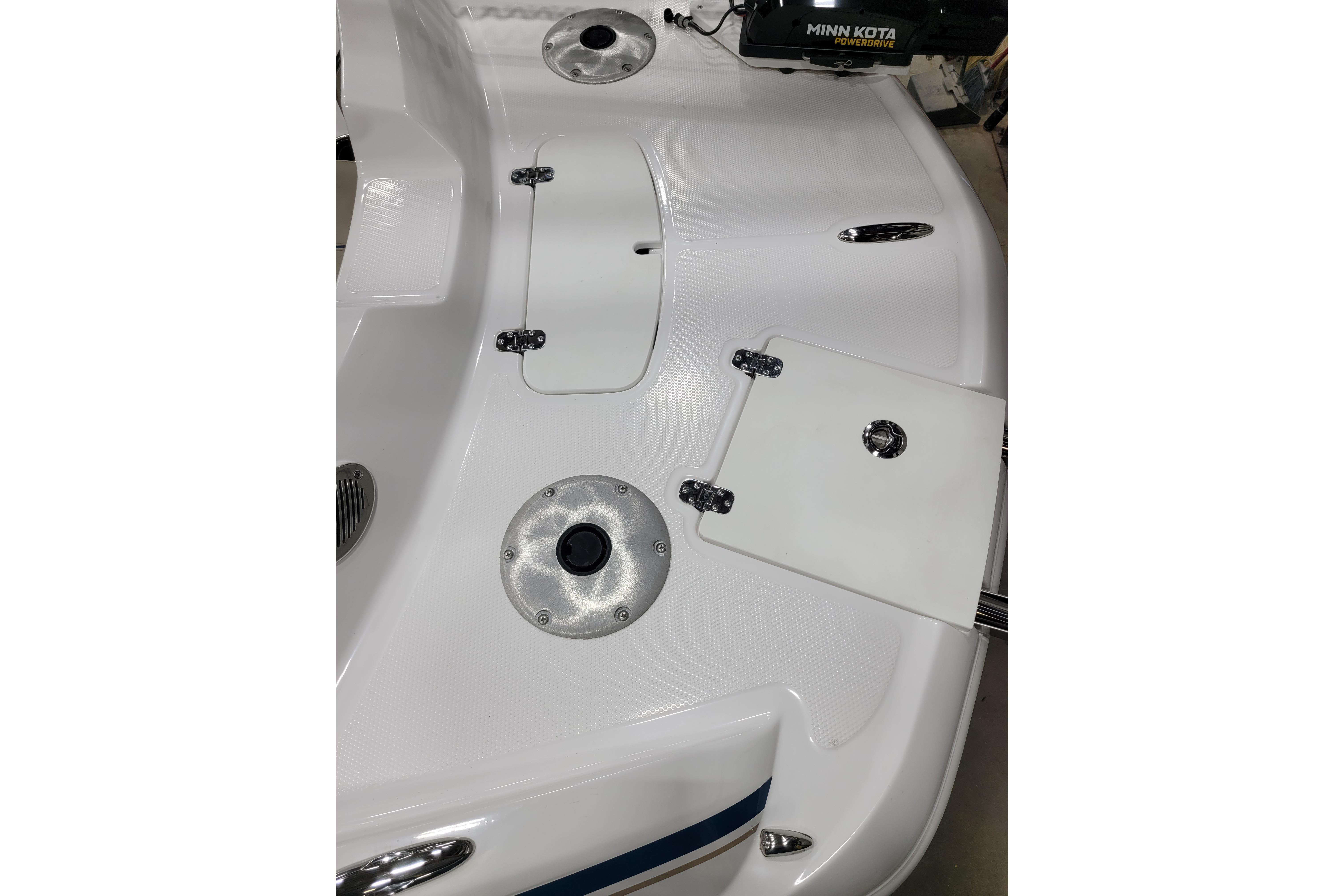 2026 Tahoe 2150 boat deck with Minn Kota PowerDrive motor and storage compartments.