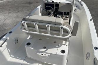 2024 Boston Whaler 220 Dauntless boat interior with seating and console.