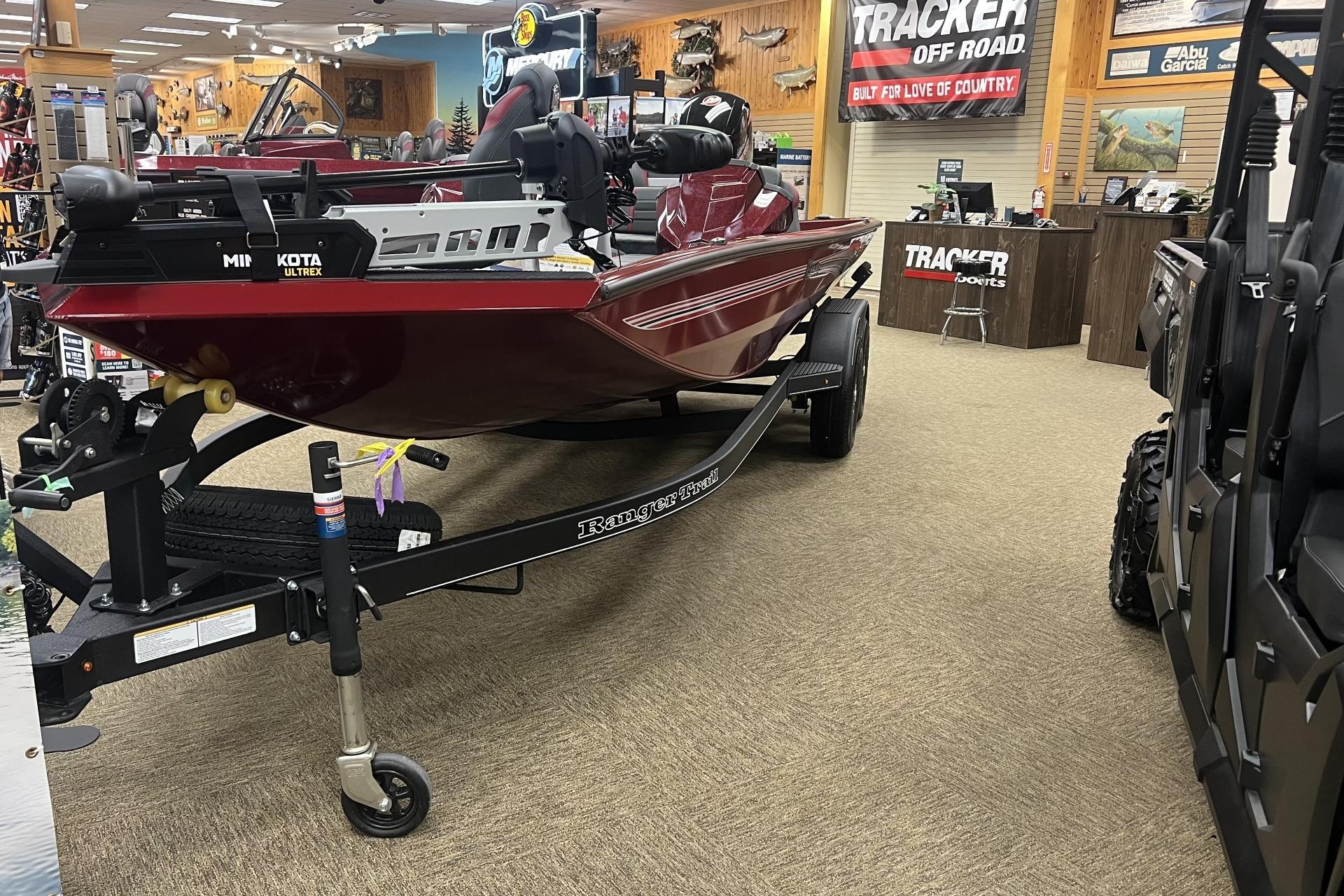 2026 Ranger RT198P boat displayed indoors at a Tracker Sports showroom.