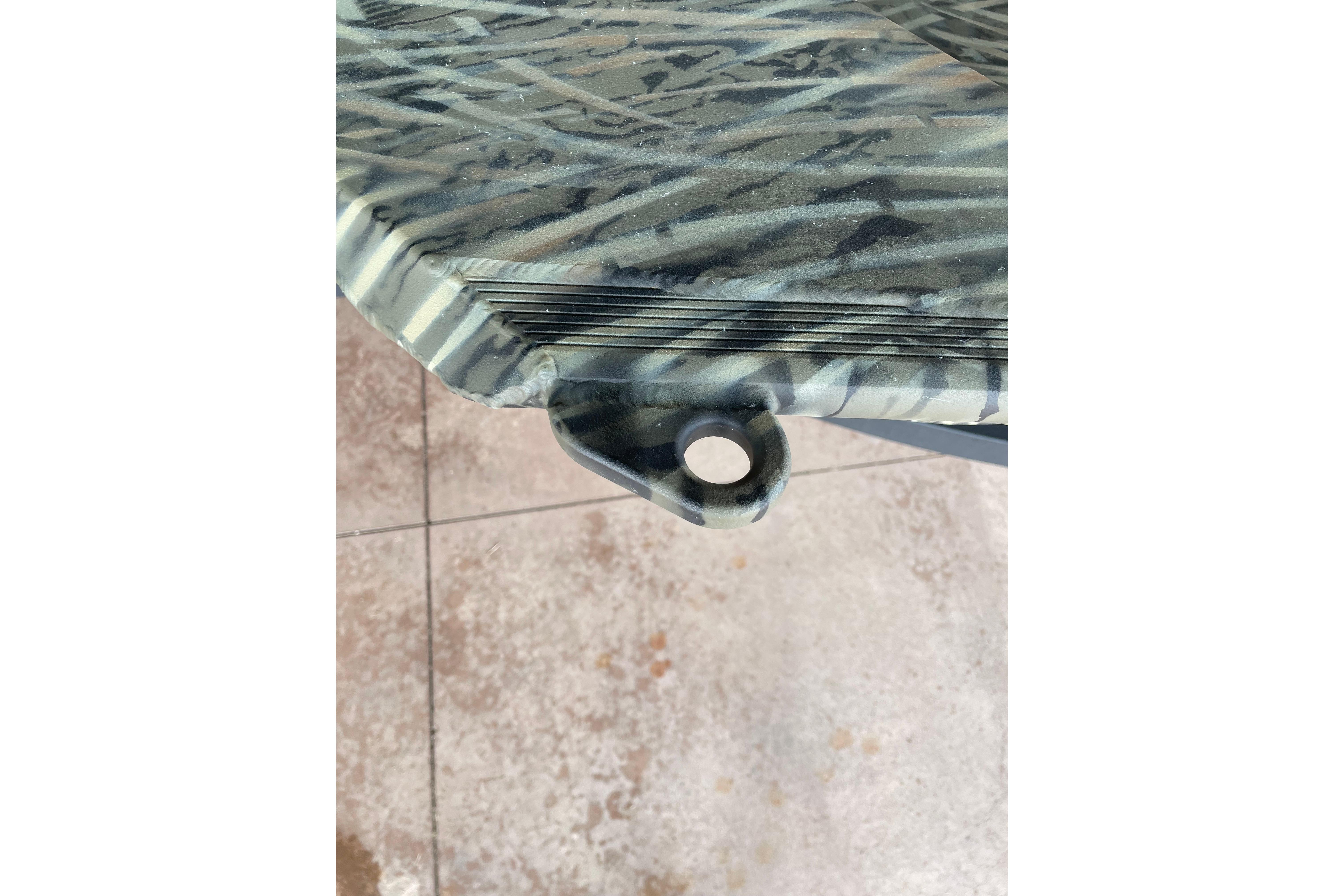 2026 Tracker Grizzly 1654 T Sportsman boat detail with camouflage pattern.
