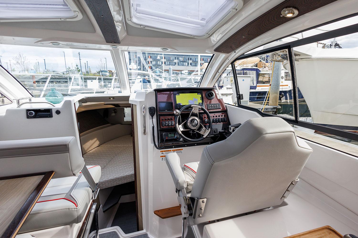Manufacturer Provided Image: Interior of 2025 Solara S-250 Coupe boat with modern helm and seating.