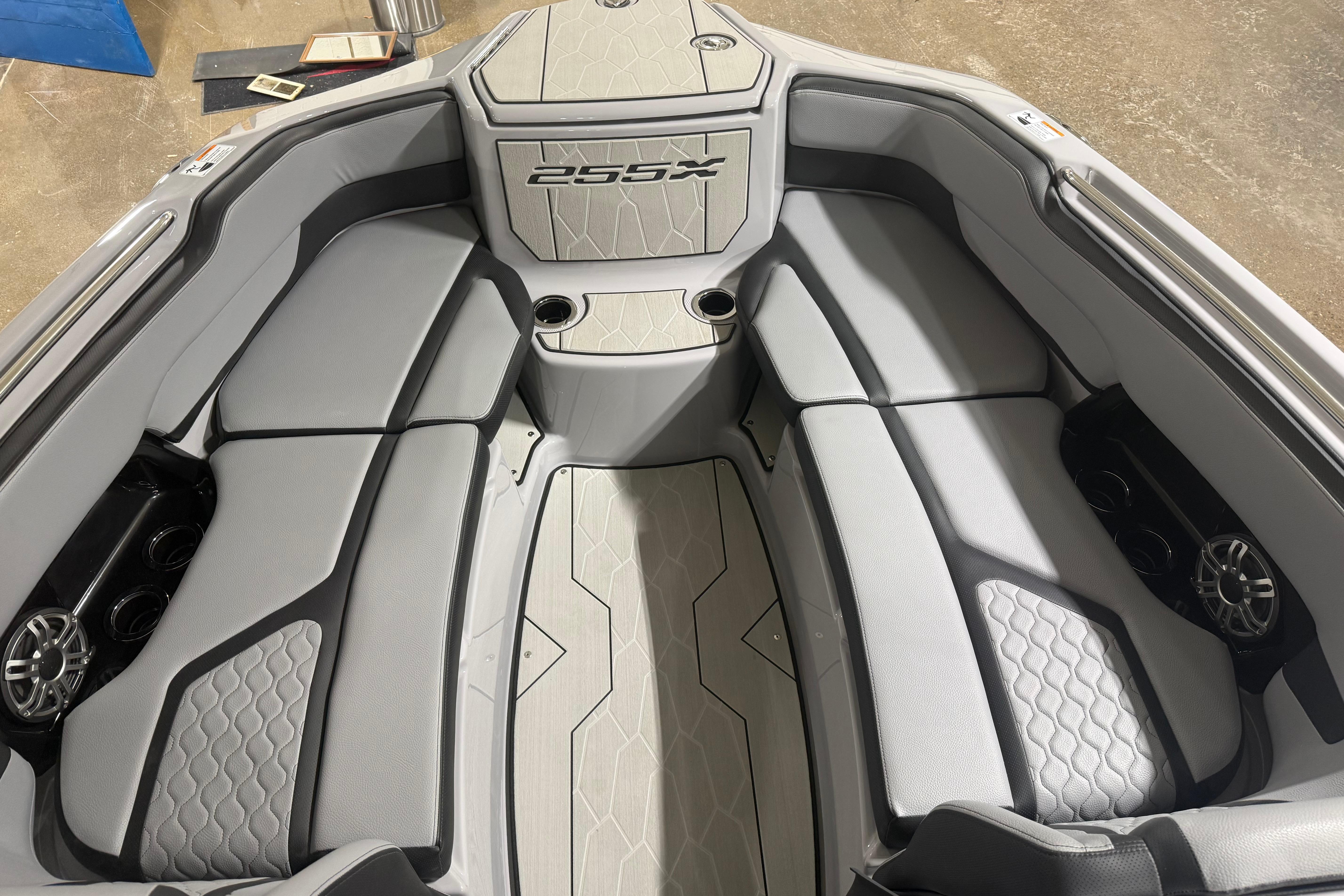 2026 Yamaha Boats 255XD interior with sleek gray seating and modern design.