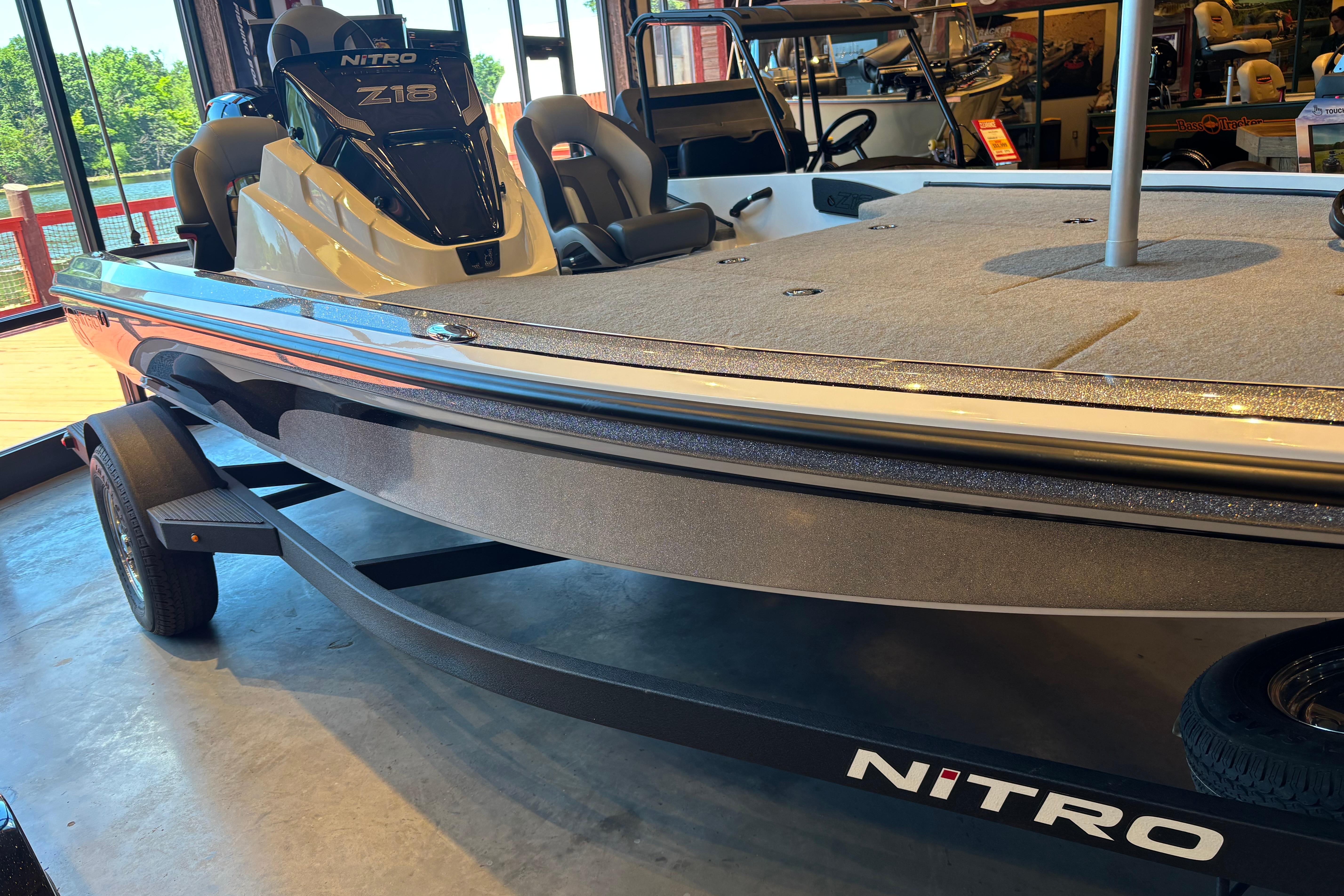 2025 Nitro Z18 boat displayed indoors, showcasing sleek design and modern features.