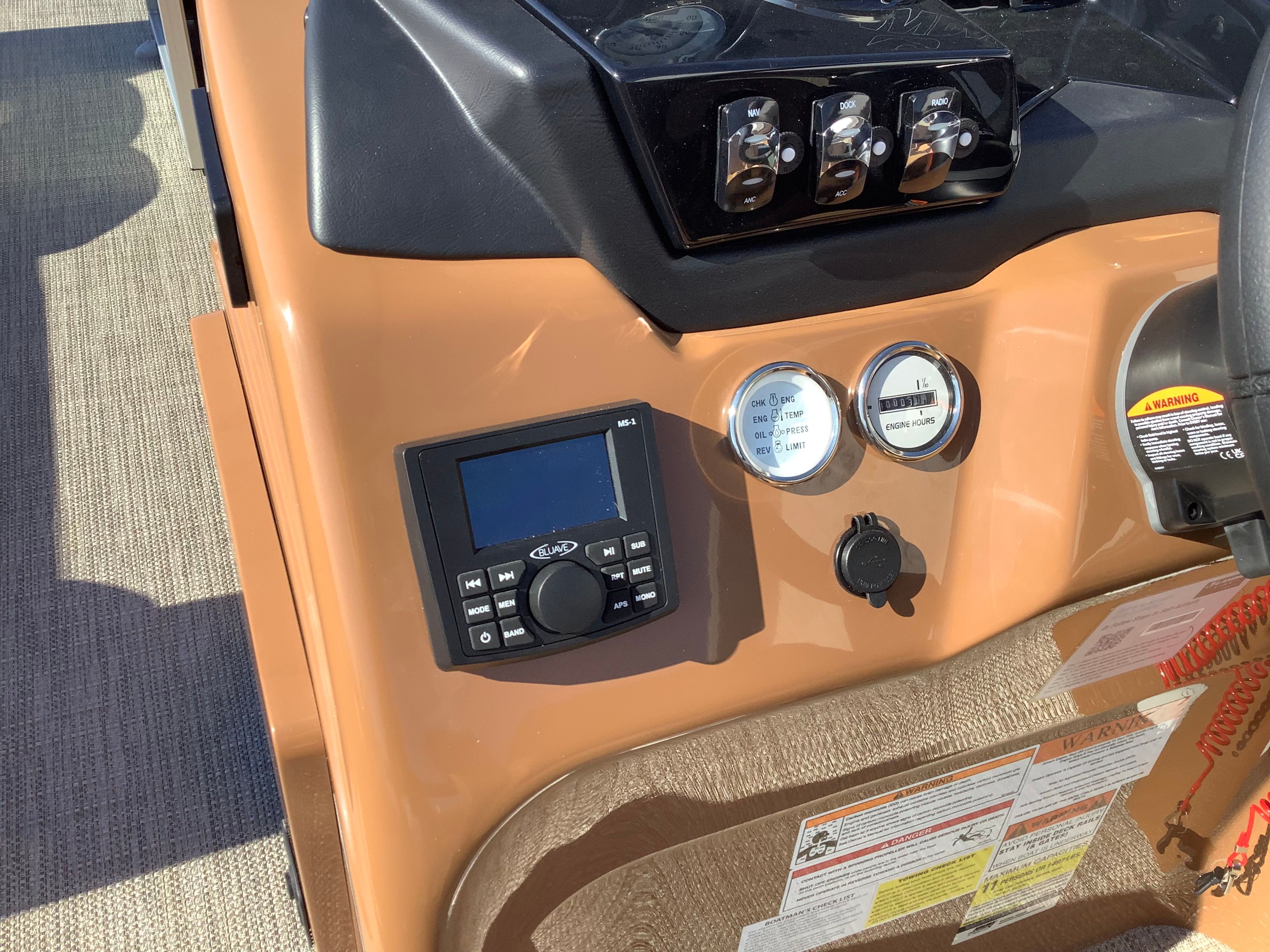 Dashboard of 2026 Landau 21 Island Breeze with controls and gauges.