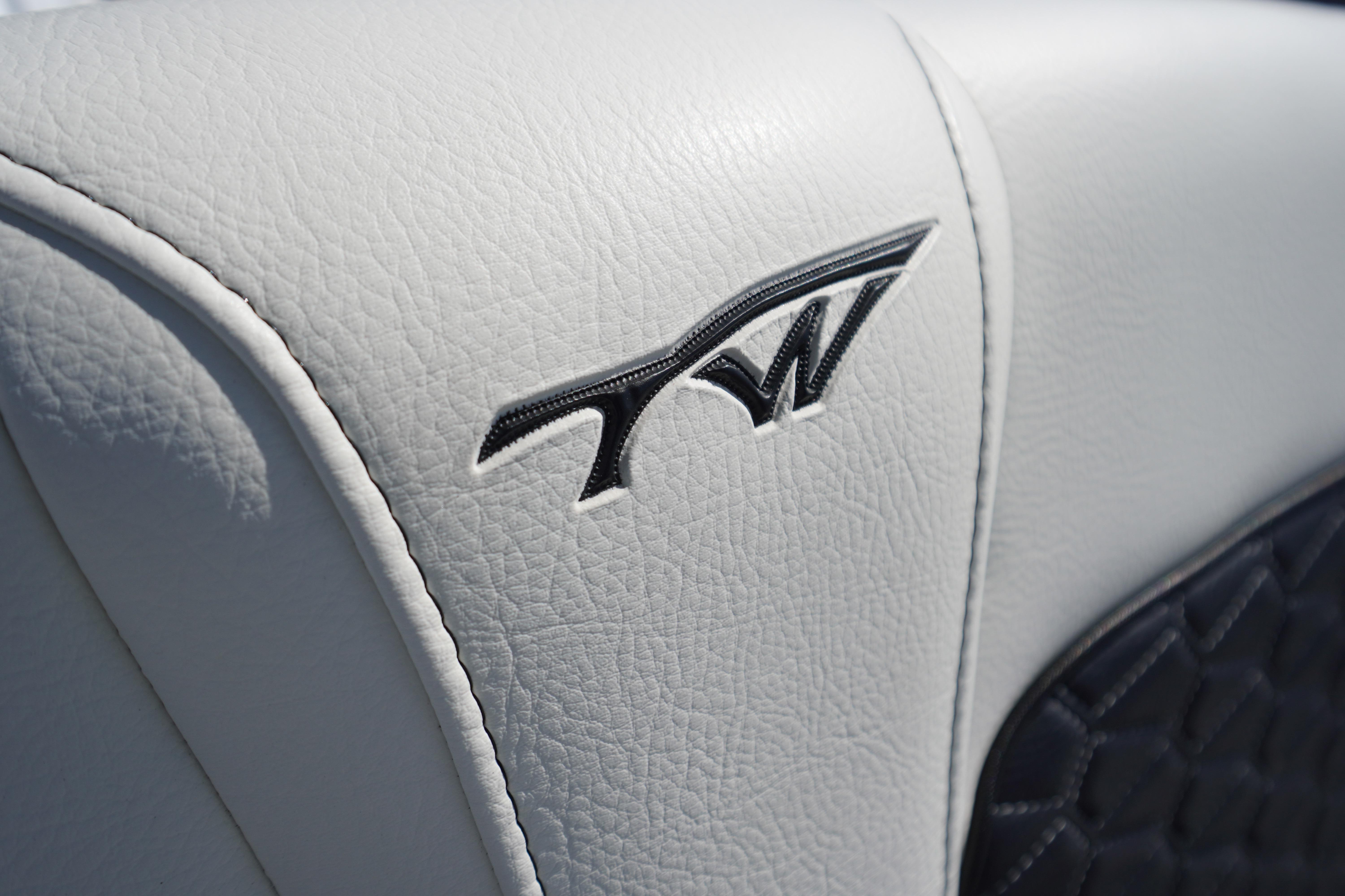 Close-up of 2025 Tidewater 232 SS boat seat with logo embroidery.