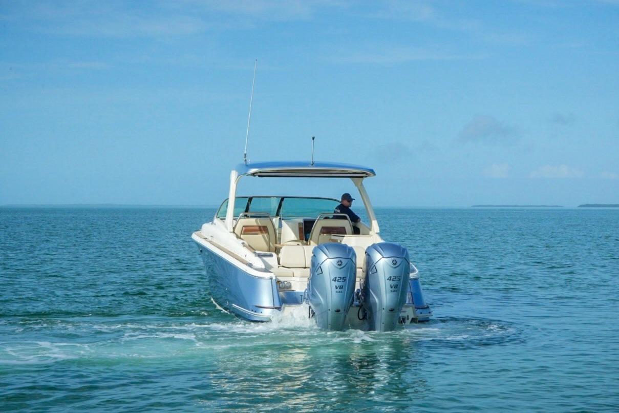 2019 Chris-Craft Launch 35 GT OB cruising on open water with twin engines.