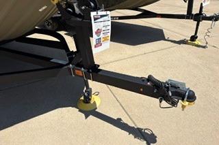 Trailer hitch of 2025 Tracker Grizzly 2072 Utility boat on concrete surface.