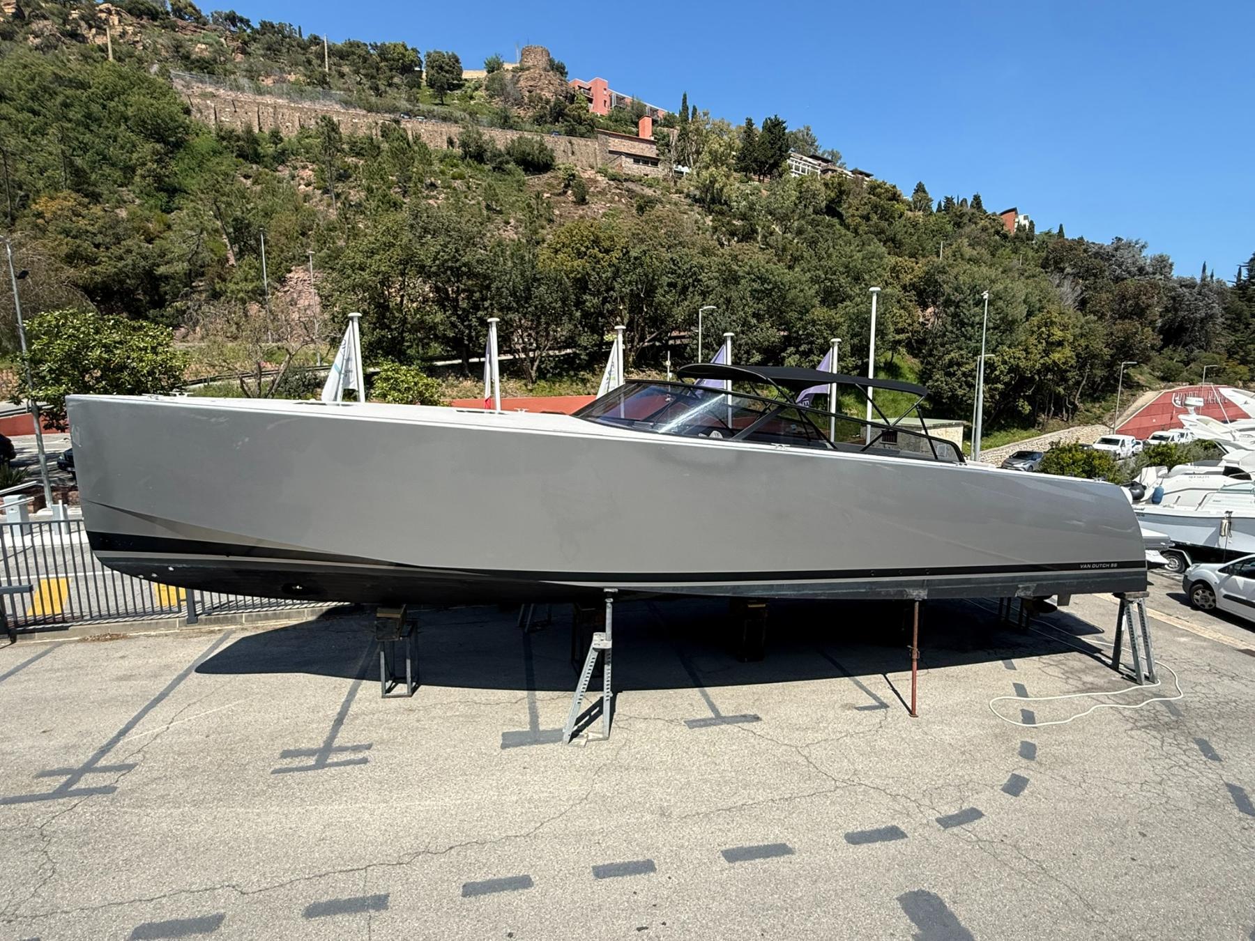 2019 VanDutch 55 yacht on stands, sleek design, outdoor setting, clear sky.