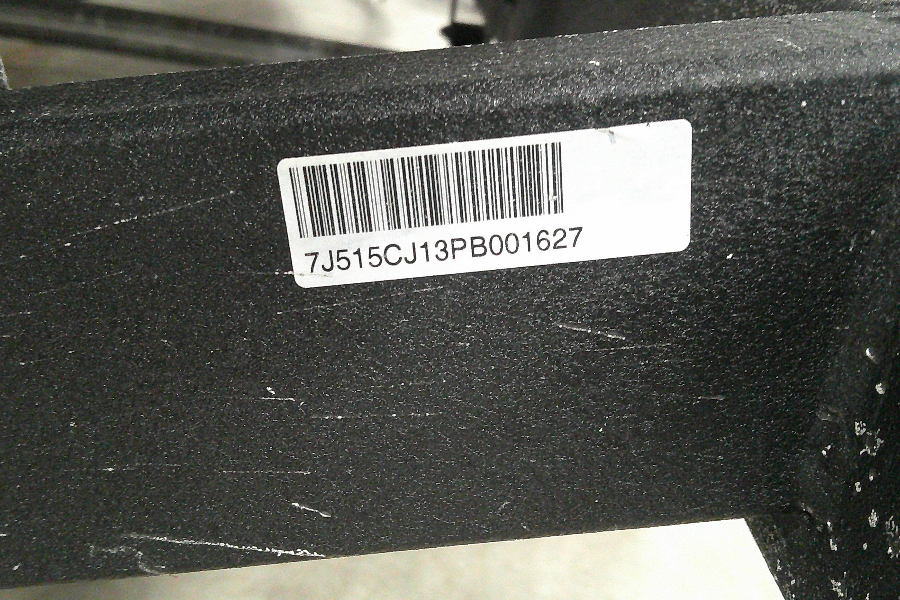 Barcode label on 2023 Tahoe T18, displaying serial number 7J515CJ13PB001627.
