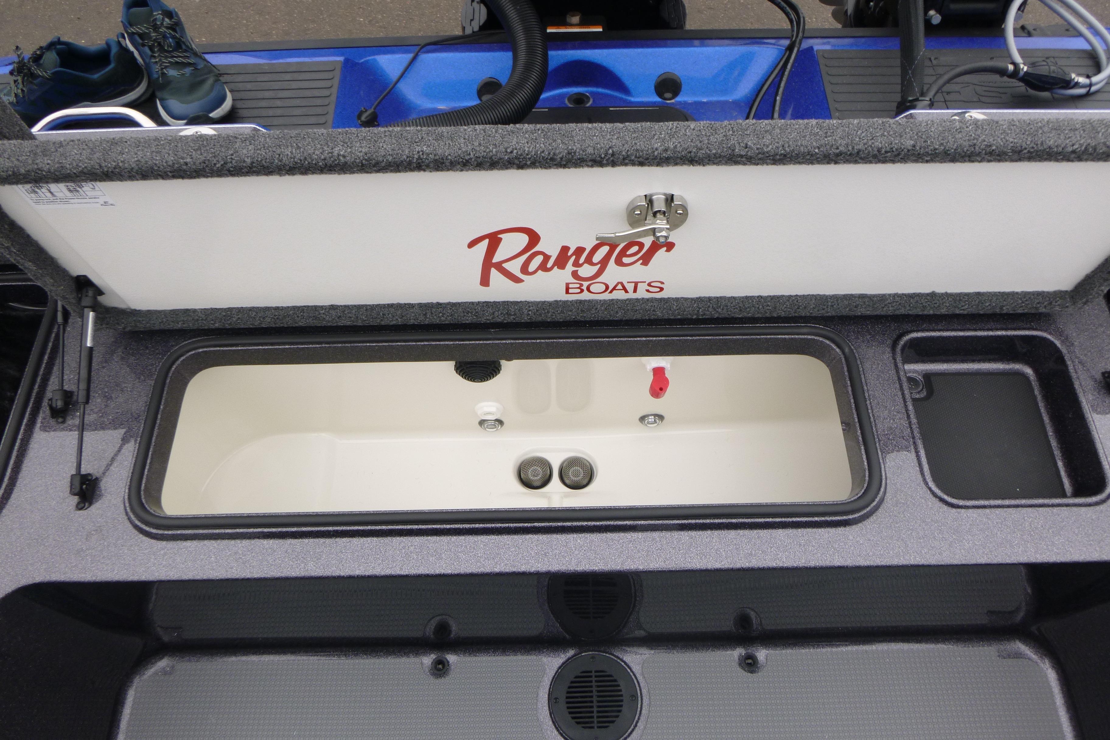 2026 Ranger 620FS Cup Equipped boat storage compartment with open lid.