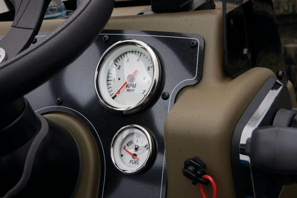 Dashboard of 2026 Tracker GRIZZLY® 2072 CC Sportsman with RPM and fuel gauges.