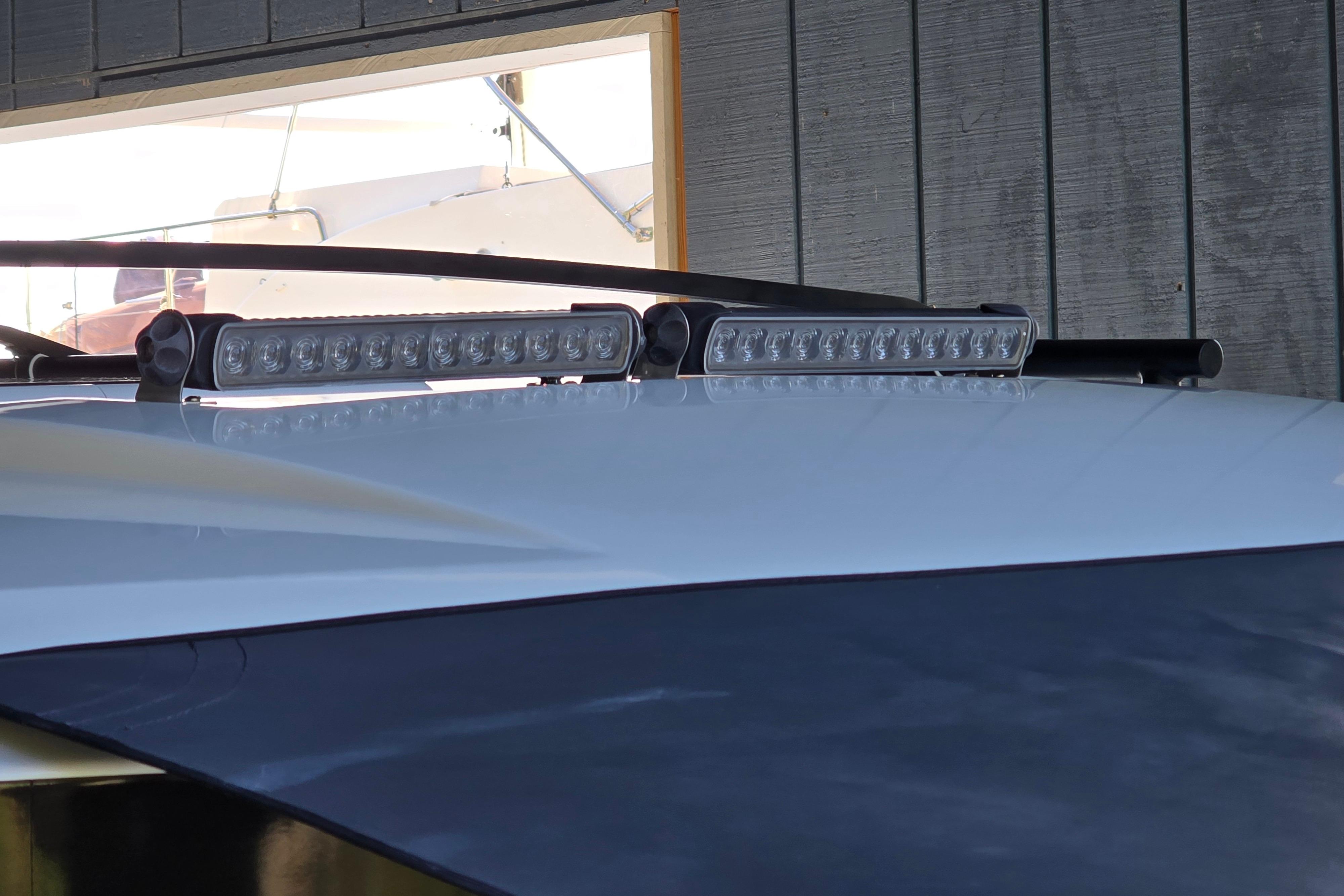The image shows the roof of a Jeanneau NC Sport 895 boat with LED lights.